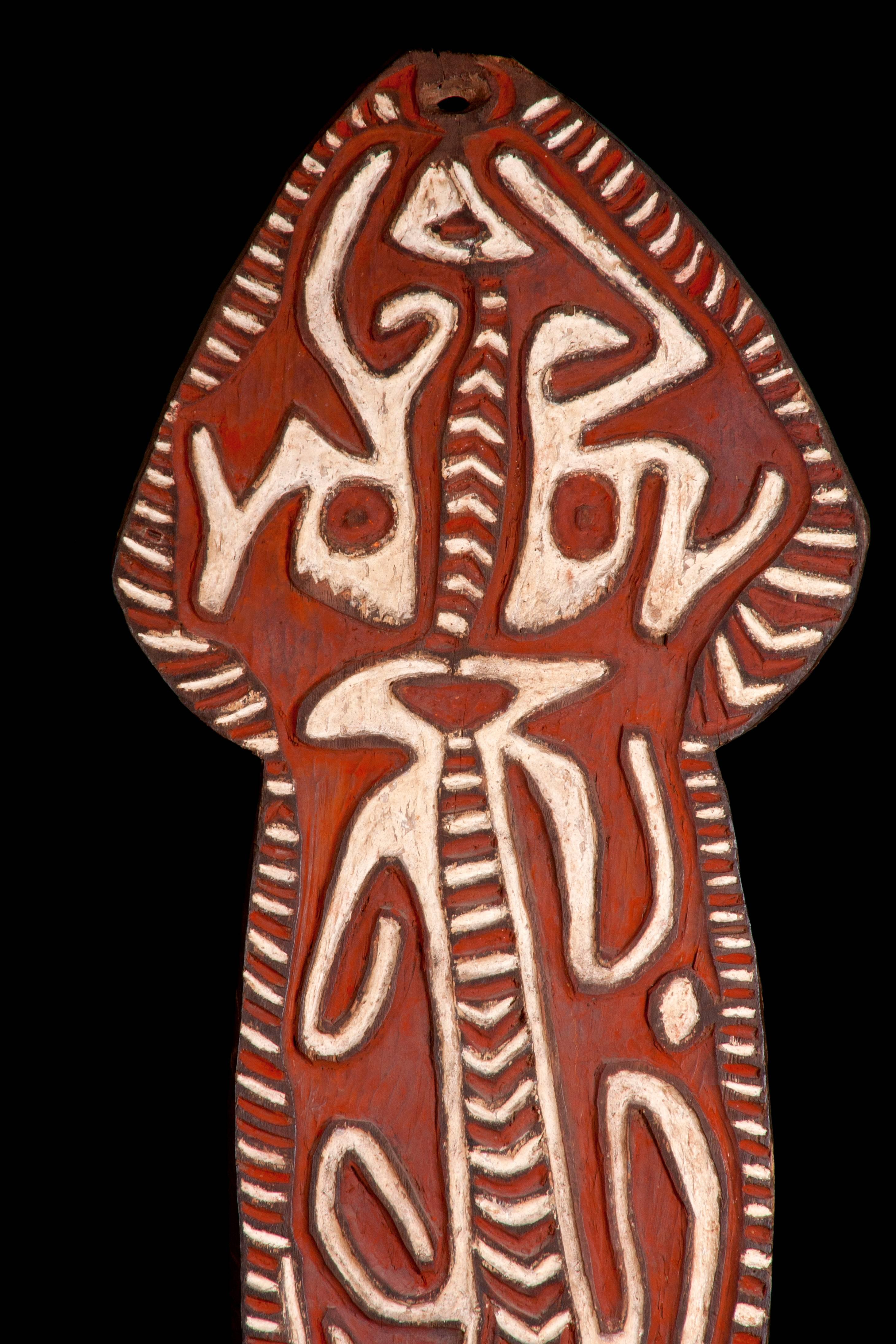 Abstract and anthropomorphic large figure from the Pie River, located to the east of the Era River. Abstract, anthropomorphic form stands on separate legs with dynamic varying outline, wide hips, and torso leading straight to a rounded head.