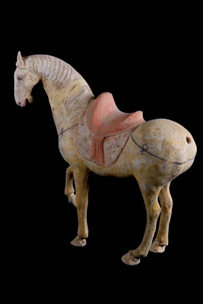 Magnificent Prancing Horse in Orange Terracotta with Traces of Yellow Painting. With its Anterior right Leg raised. TL Test by ASA Francine Maurer Laboratory.  It was during the 