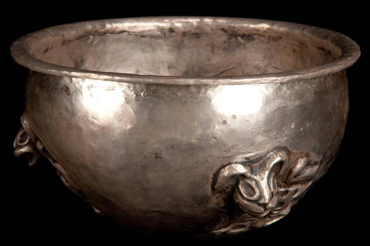 Rare and Beautiful Chimu Silver Bowl with 3 Felines in Repousse Technique, curved over rim. The deepness of the repousse is almost a high relief of incredible size. A true “tour de force” piece of a highly developed and skillful technique very