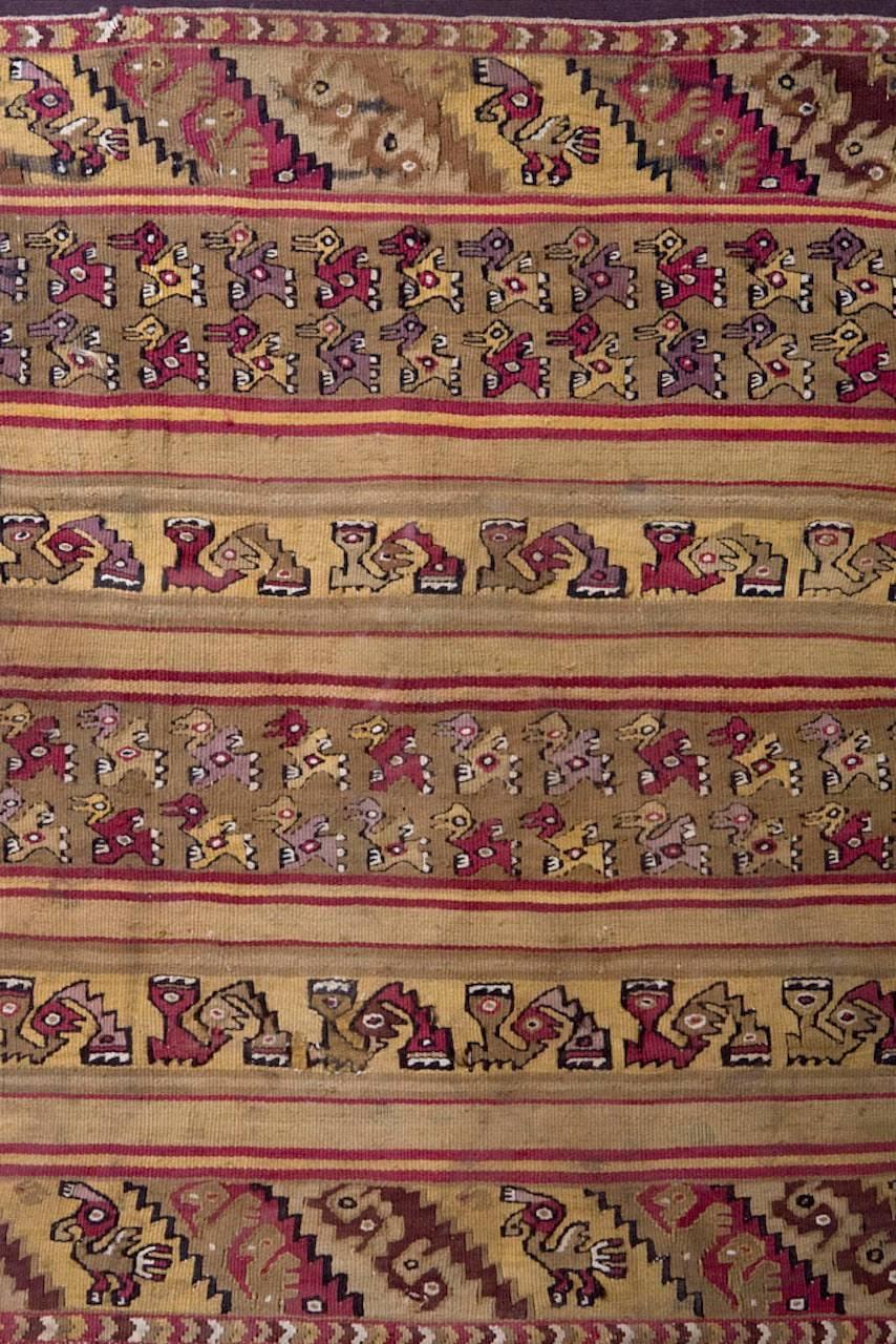 Beautiful and Impressive Fragment of a Multicolor Banner with Ocher, Red and Purple with Geometric Designs with Birds and Mythic Creatures in Horizontal Bands. 

This piece is accompanied by a European Cultural Goods Certificate (Certificat pour un
