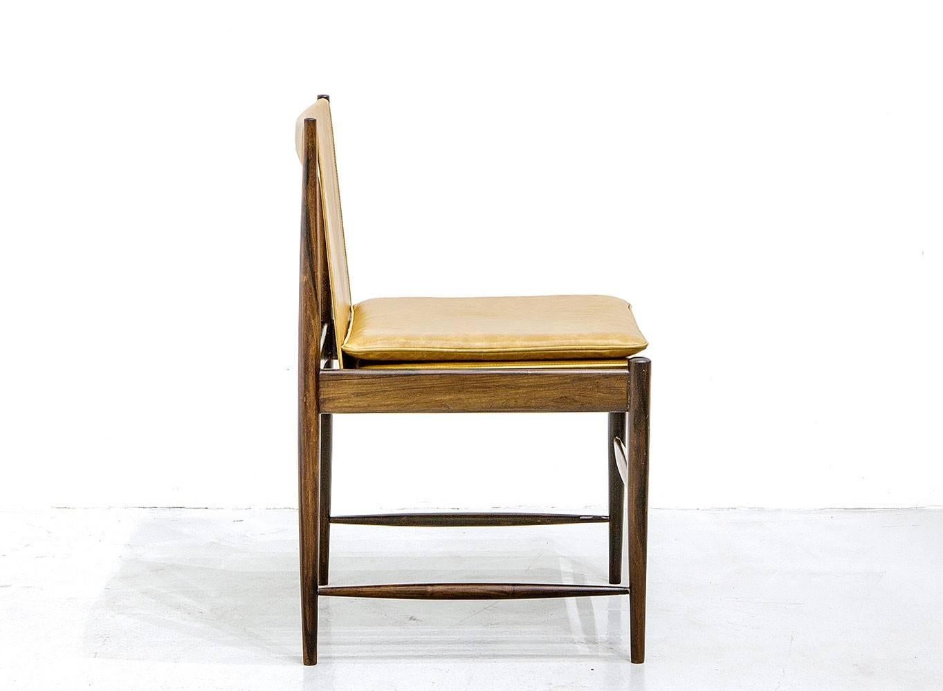 The design of Sergio Rodrigues is the embodiment of Brazilian identity and creativity.
This set of chairs is a fine example of his exquisite use of the tropical wood and polished craftsmanship.
The pieces were recently restored and reupholstered