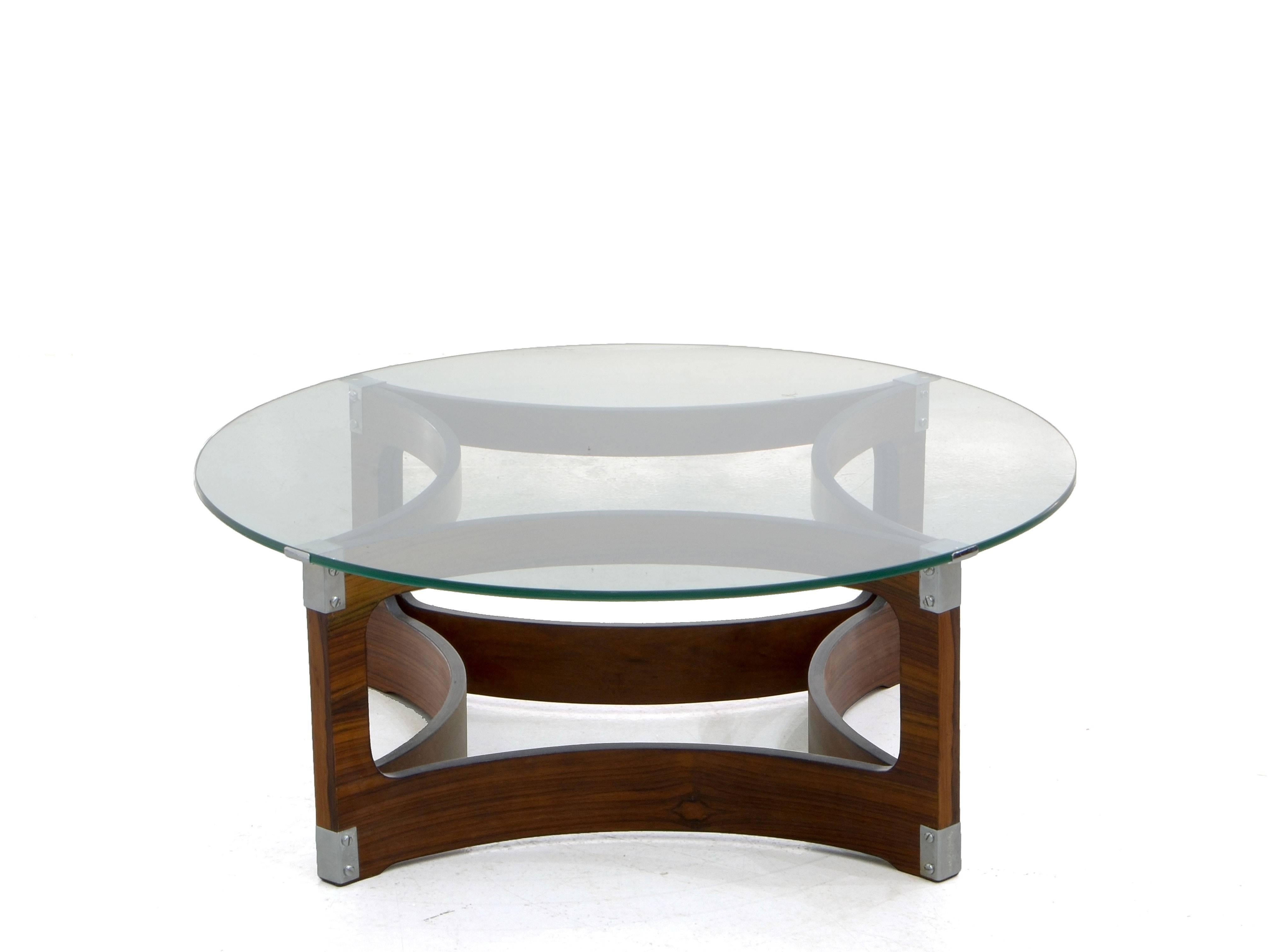 A set of two side tables and one coffee table by Jorge Zalszupin.

Originally born in Poland, Jorge Zalszupin built his entire career in Brazil, where he's absorbed many influences for his design, specially the care and attention for the treatment