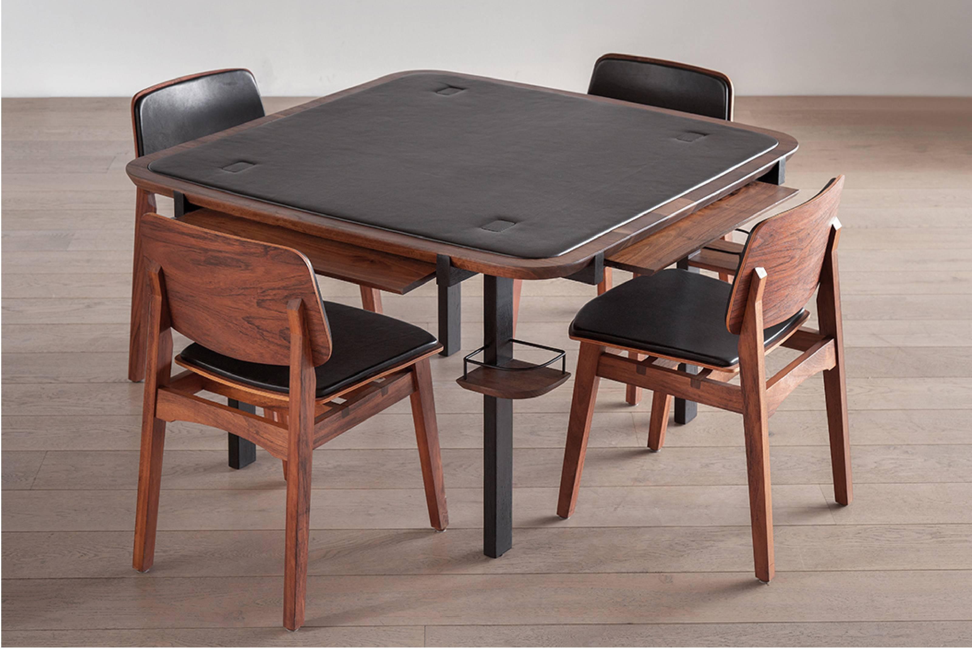 Purpose built for gaming, the Newton Table offers the well-worn character of traditional Mexican furnishings. The tabletop, inset with leather, allows for smooth dealing and flawless dice throwing. Four drawers tucked flush with the apron store