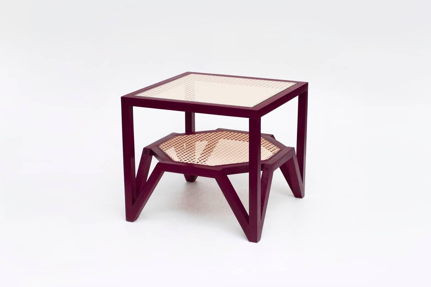 The side table was designed to simulate the moiré pattern, a visual effect that occurs when viewing a set of lines or dots that overlaps on another set of lines or dots, where the sets differ in size, angle, or spacing. In order to create this