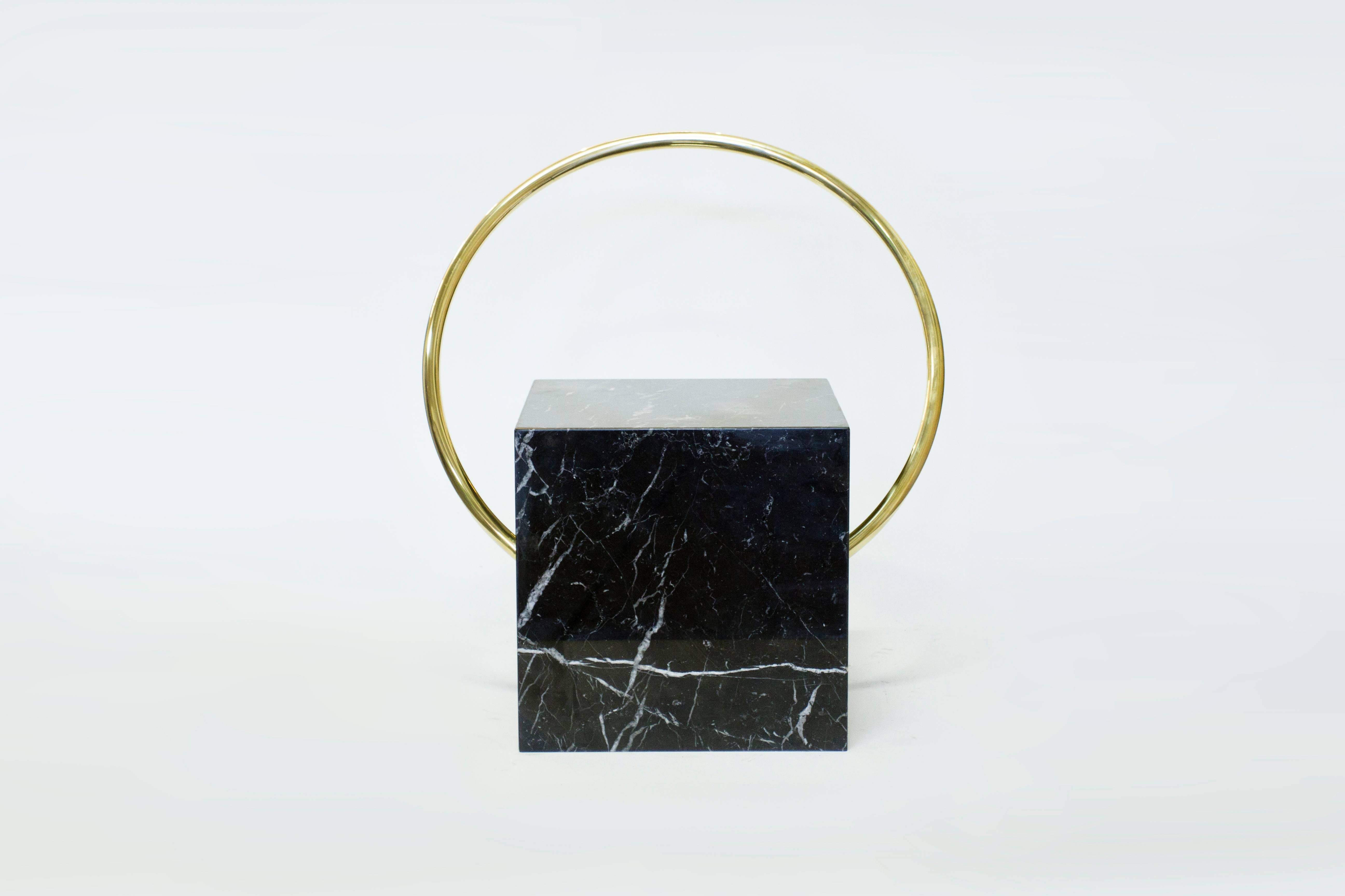 Aro stool is made of Italian marble Nero Marquina and curved brass.
As any natural material, variations on marble swirls and veins will occur.
Limited series of 6 pieces.

Aro stool makes part of Adornment Series, a series of furniture, objects, and