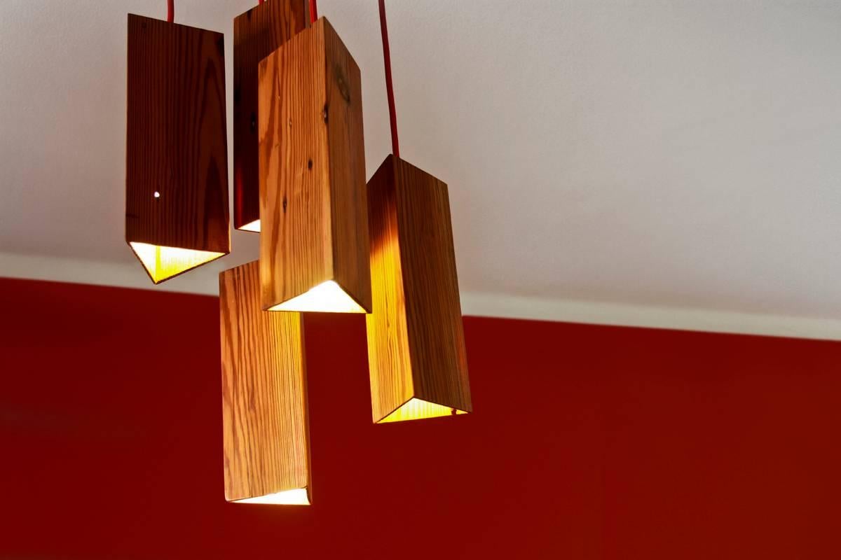 This pendant lamp is an artisanal product designed and manufactured in Rio de Janeiro. It is 100% handmade of reclaimed pine wood from eastern Europe, brought to Brazil in the 1700s-1800s as ship's ballasts. When in Brazilian land, these woods were