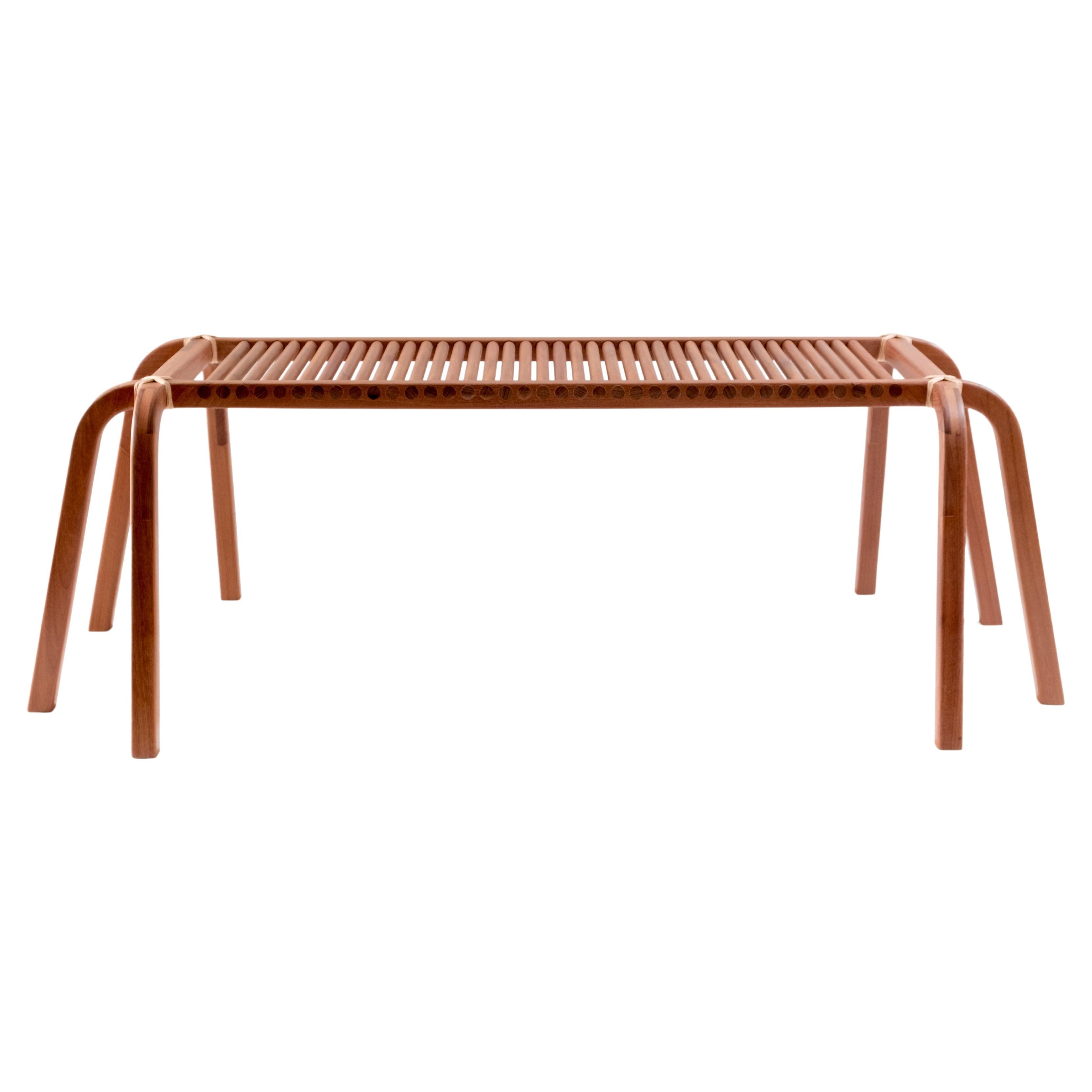 Embira Bench: made in Brazil with pink jequitba wood and natural dyed yarns