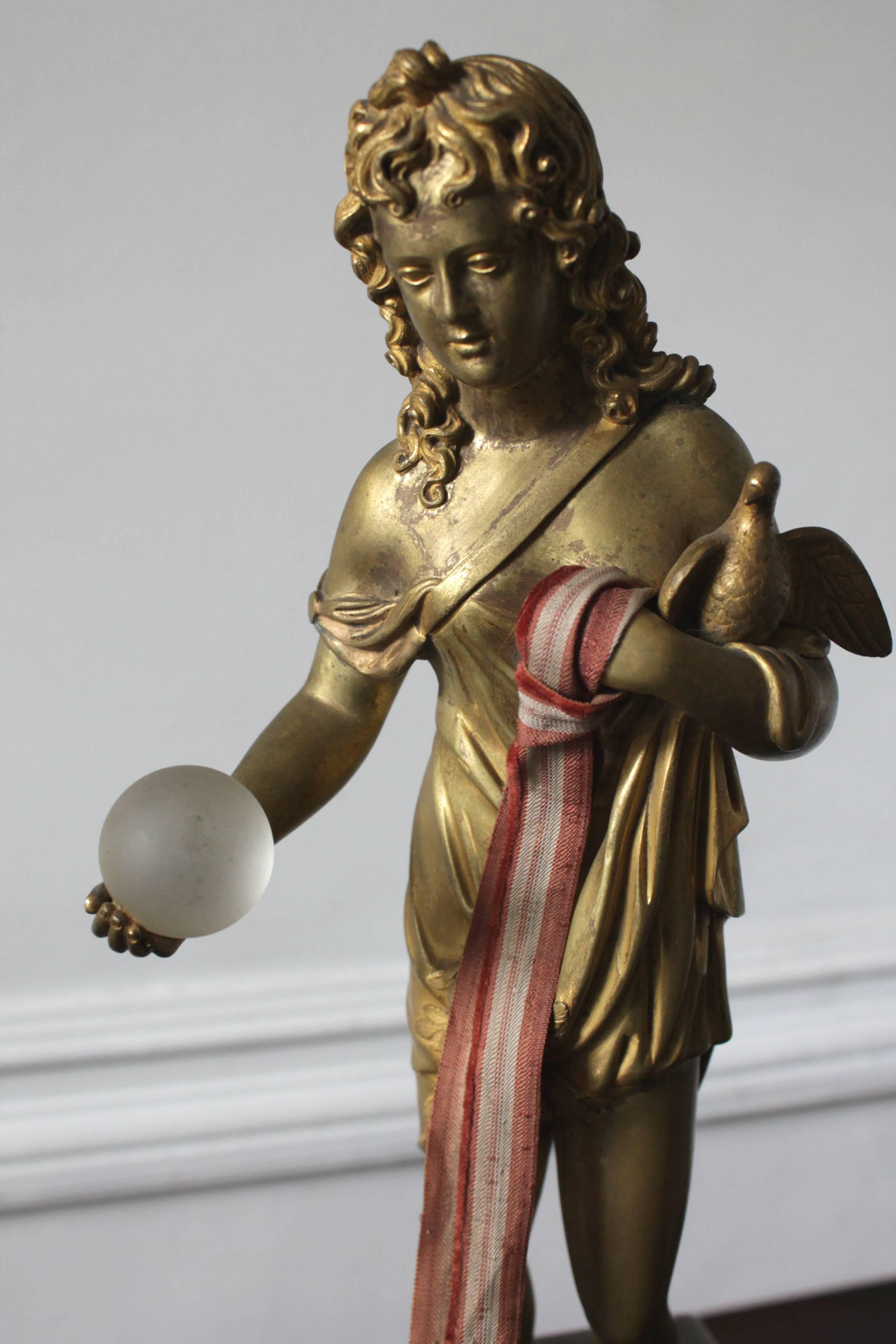 French bronze sculpture from the 19th century, intervened with a glass sphere and Genoese velvet dating from the 18th century.

One of a kind piece.