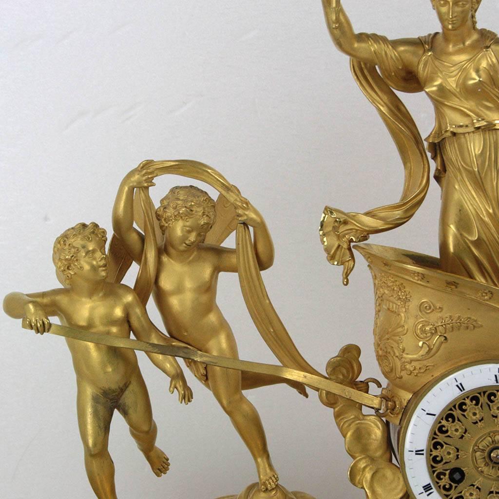 Fine and important ormolu 18th century clock-in perfect condition.
A chariot and cupids on base clock.
The original gilding is in exquisite condition and the mechanism was revised years ago.
Original Pendulum Empire, all in gilded bronze, of high