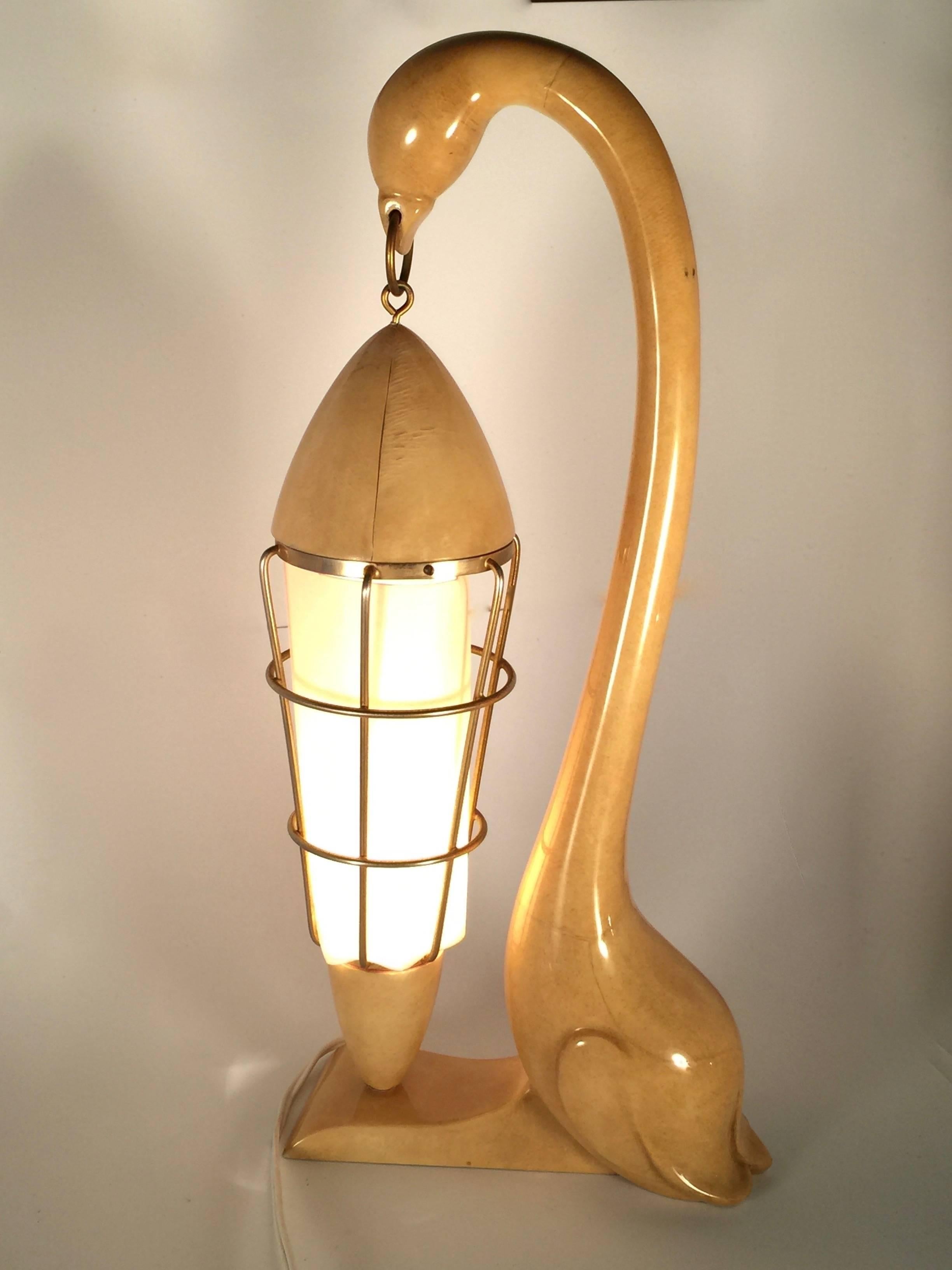 Vintage Aldo Tura goatskin, wood and brass lamp. 

1950s Made in Italy.

This piece is in good vintage condition with porous grains on the brass details.

An amazing and seldom piece in this condition.