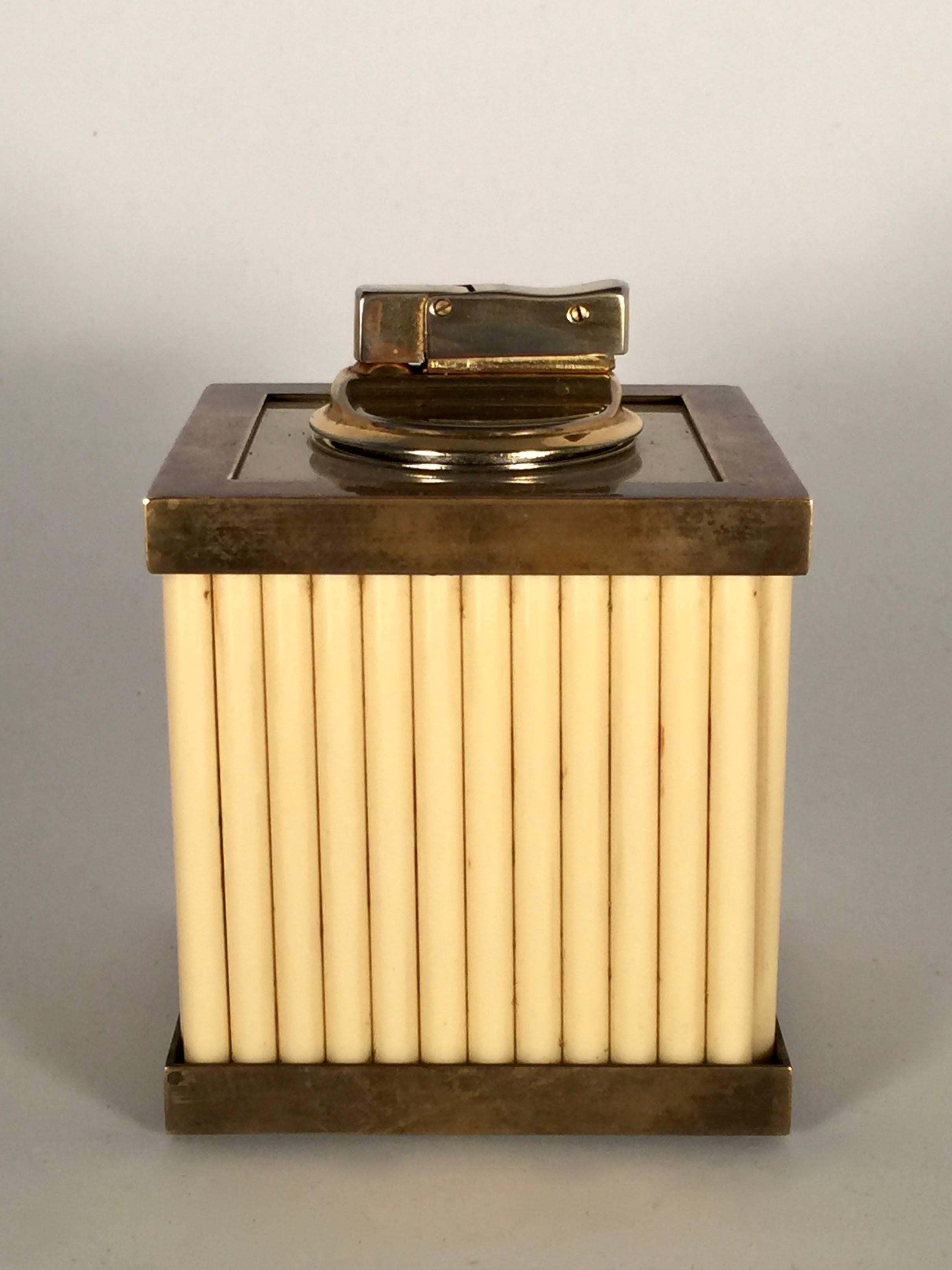 Vintage Tommaso Barbi Lucite and brass table lighter.
1970s made in Italy. 

An amazing and seldom piece in this condition. Some abrasion on the brass detail. Look carefully at the pictures.

Please notice this item need flint and gas.