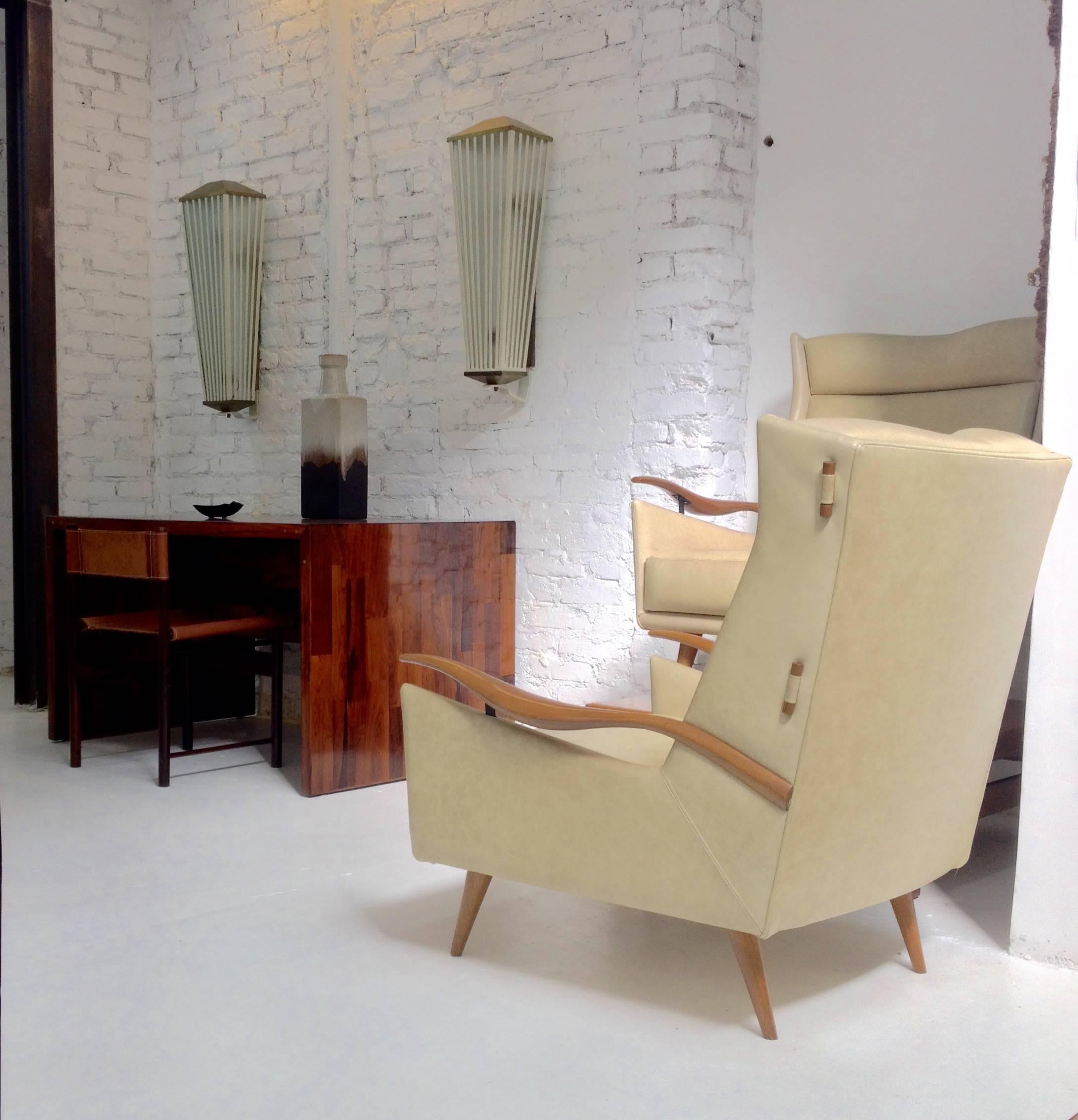 Brazilian armchair and ottoman in leather and caviuna wood by Giuseppe Scapinelli
height
armchair: 89cm W x 81cm D x 90cm H – ottoman: 52cm W x 30cm D x 36.5cm H.