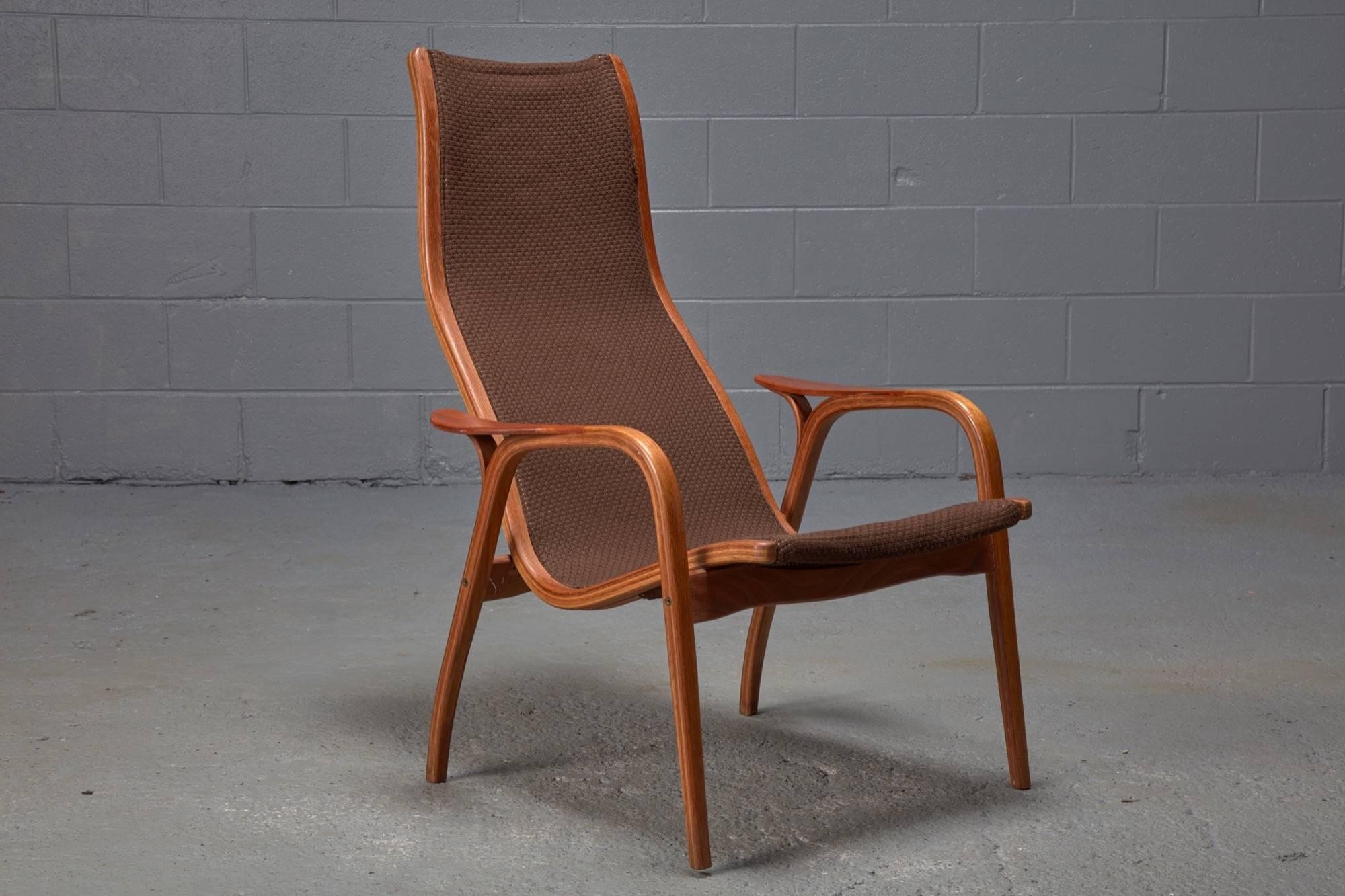 In the 1960s, Yngve Ekstrom designed the Lamino lounge chair for Swedese. The seat and back of the chair was designed to provide the greatest level of comfort to those who sit in it. The chairs feature oak and teak wood and their original textile.