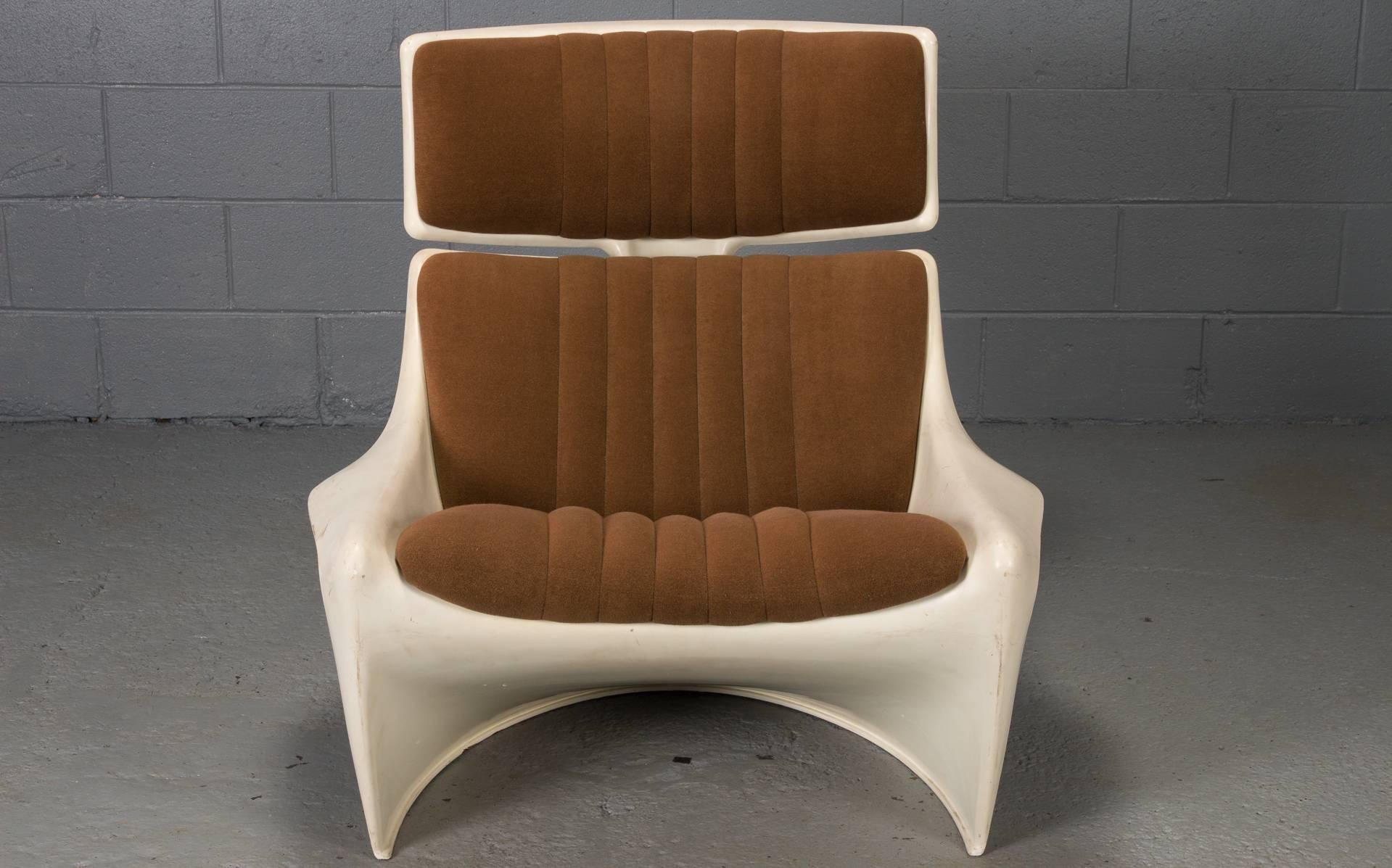 Designed by Steen Ostergaard and constructed with plastic, this lounge chair and ottoman duo is symbolic of the 1970s.