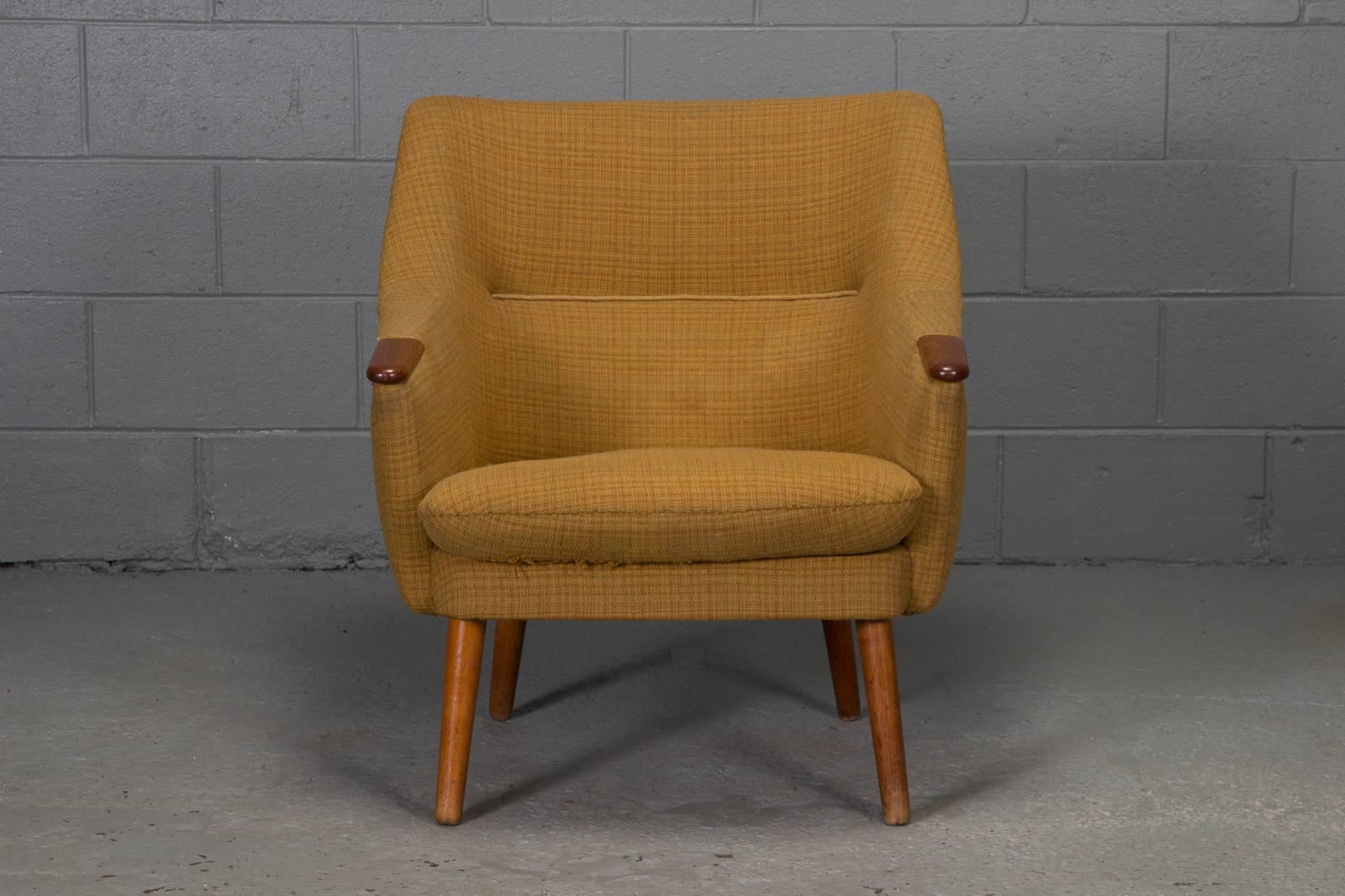 Low back Danish modern lounge chair with original textile.