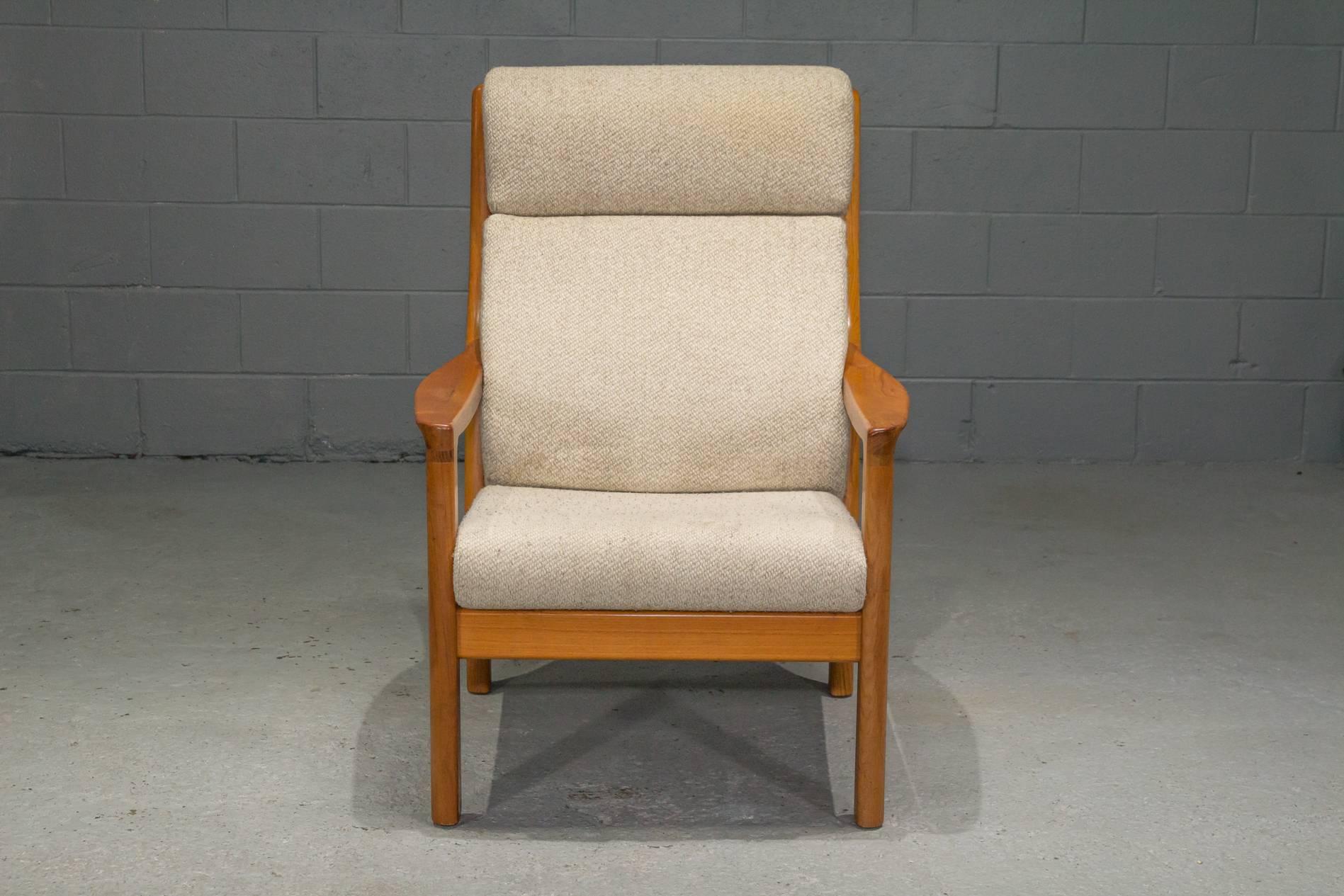 Teak high back armchair by Johannes Andersen for CFC Silkeborg. Extremely sturdy, comfortable and supportive.
