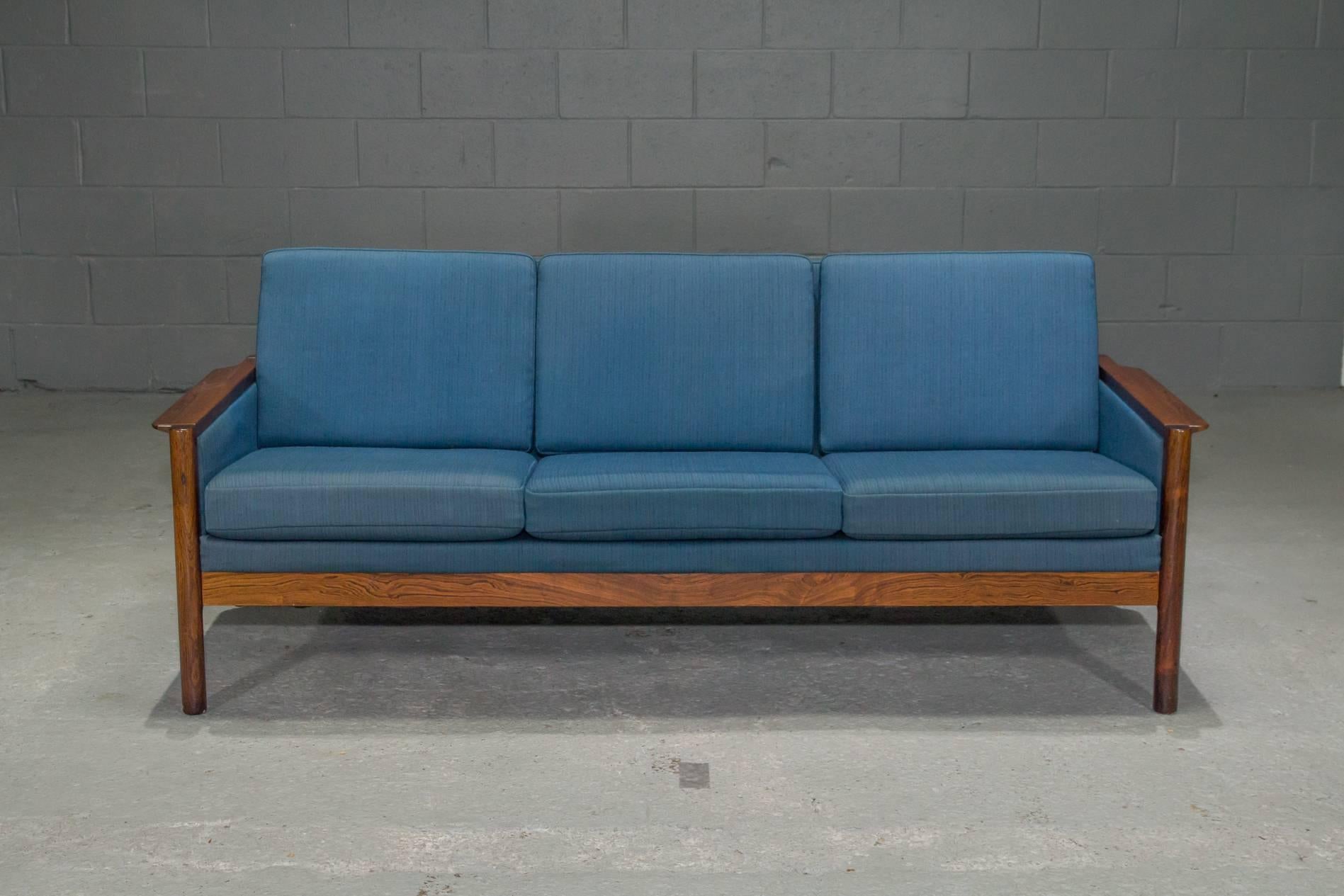 Three-Seat Danish Modern Rosewood Sofa with Blue Textile. 1960s. Beautiful solid rosewood frame. Matching armchair and settee also available.