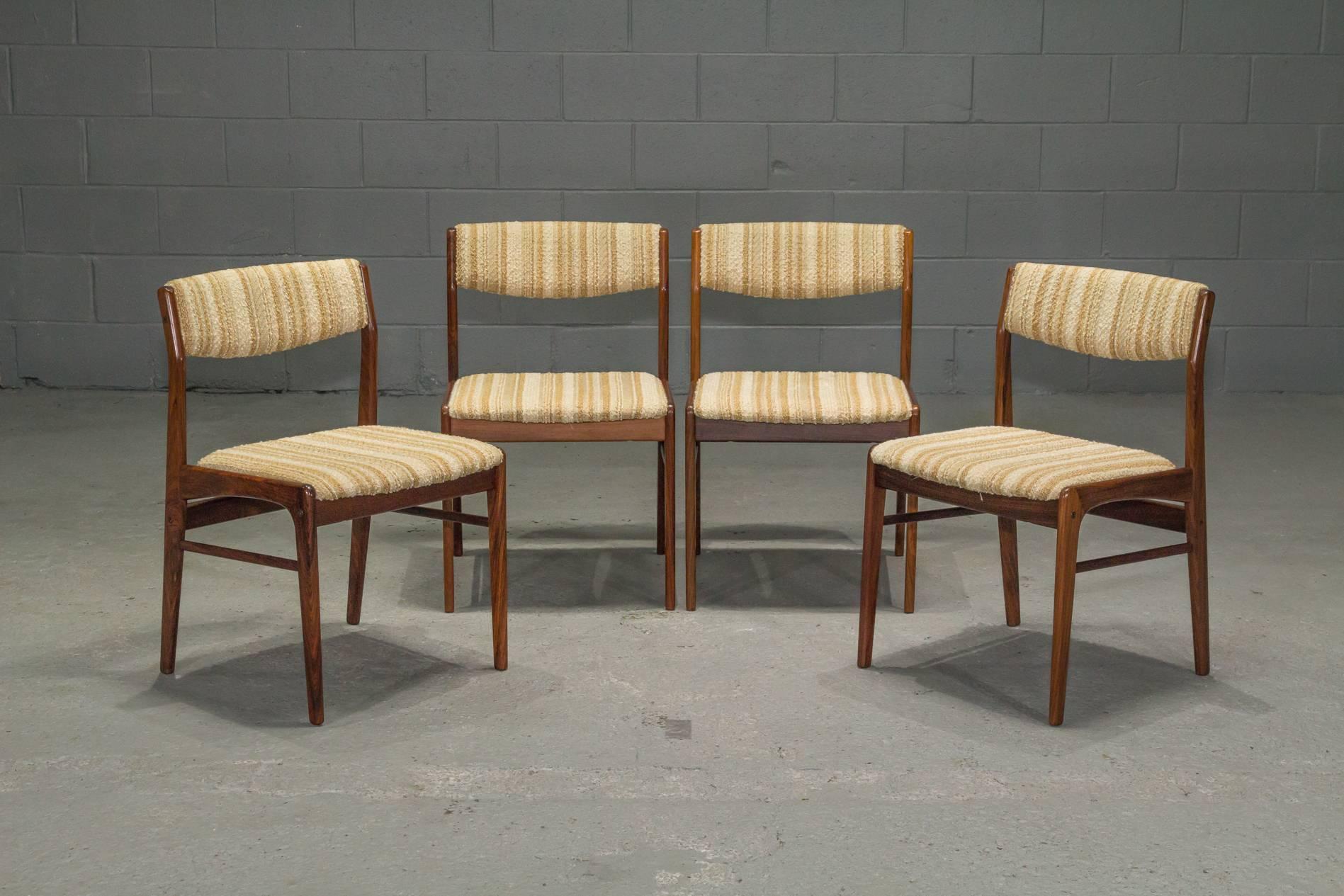 Set of 4 Danish Modern Rosewood Dining Chairs by Thorso Stole. Beautifully detailed joinery. Original textile in good condition but ready to reupholster in the fabric of your choice. 
