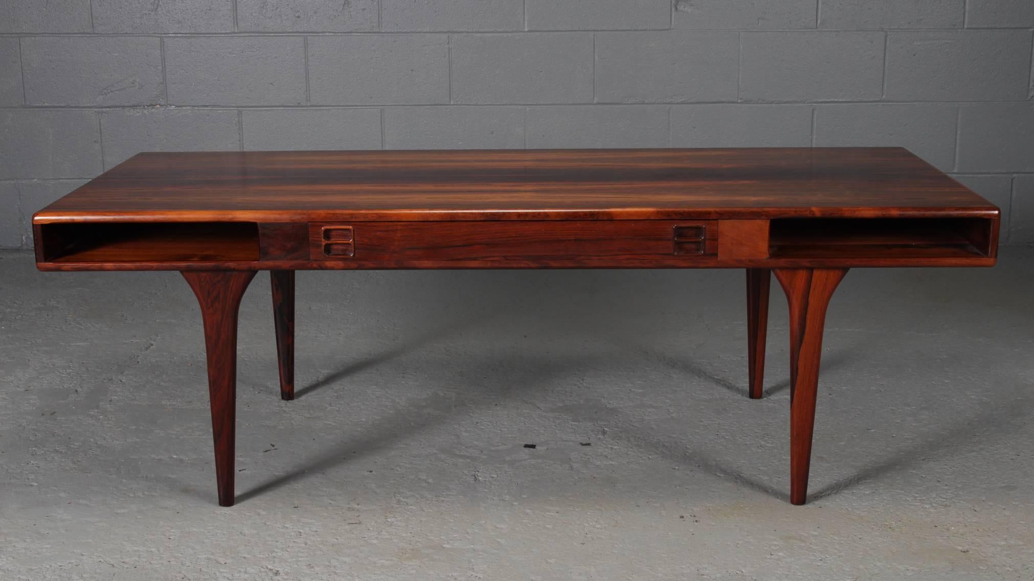 Rare Danish rosewood coffee table by Jorgen and Nanna Ditzel. Drawers on either side.