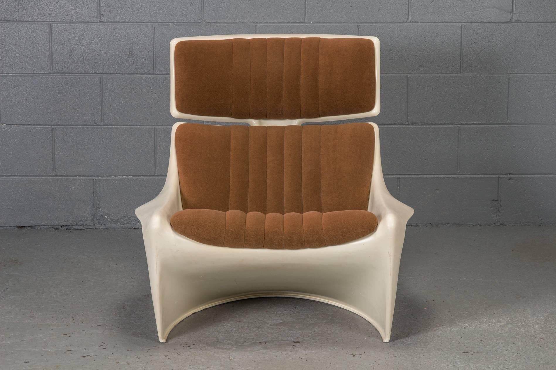 Designed by Steen Ostergaard and constructed with plastic, this lounge chair and ottoman duo is symbolic of the 1970s.