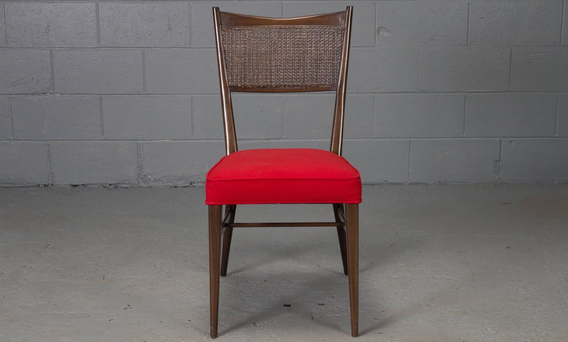 Four caned back chairs designed by Paul McCobb for Directional with new red wool high-quality upholstery.