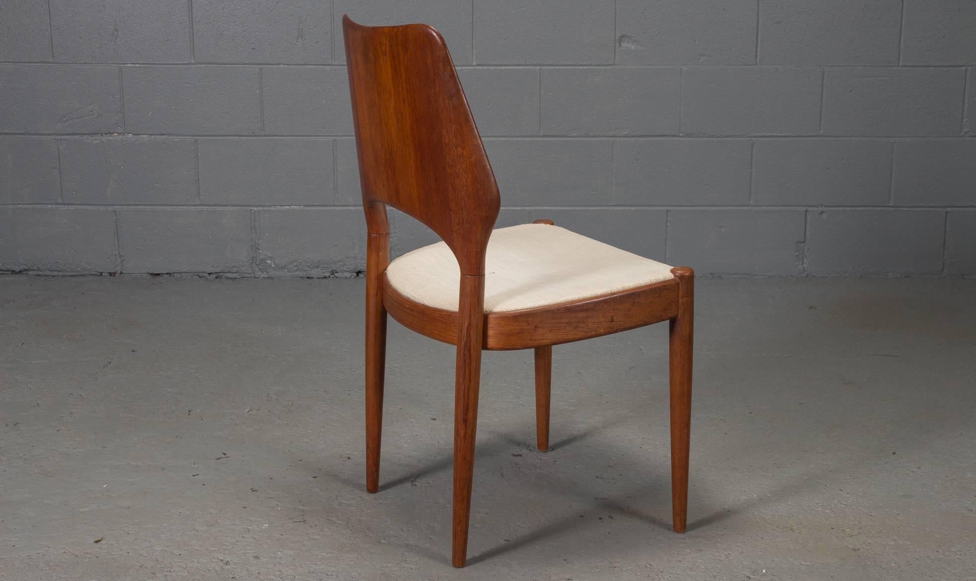 Mid-Century Modern Set of Four Danish Modern Solid Teak Finback Dining Chairs, 1950s