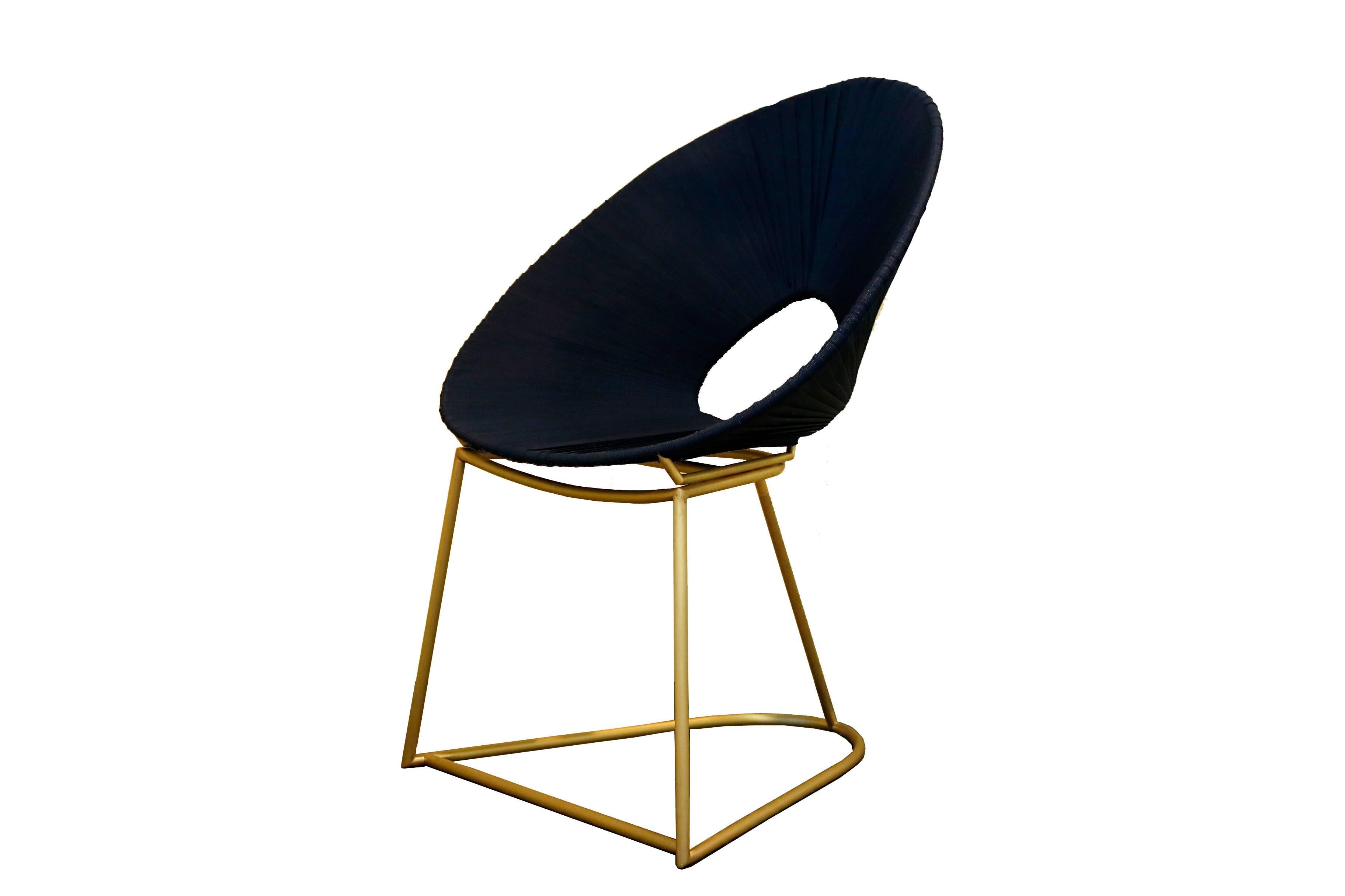 Cacique is a brushed brass structured chair with nylon ropes woven around as a mean to resemble an indigenous feathered headdress, more exactly, the ones made by the Bororo Indians. 

As concepts and ideas go along with the products they