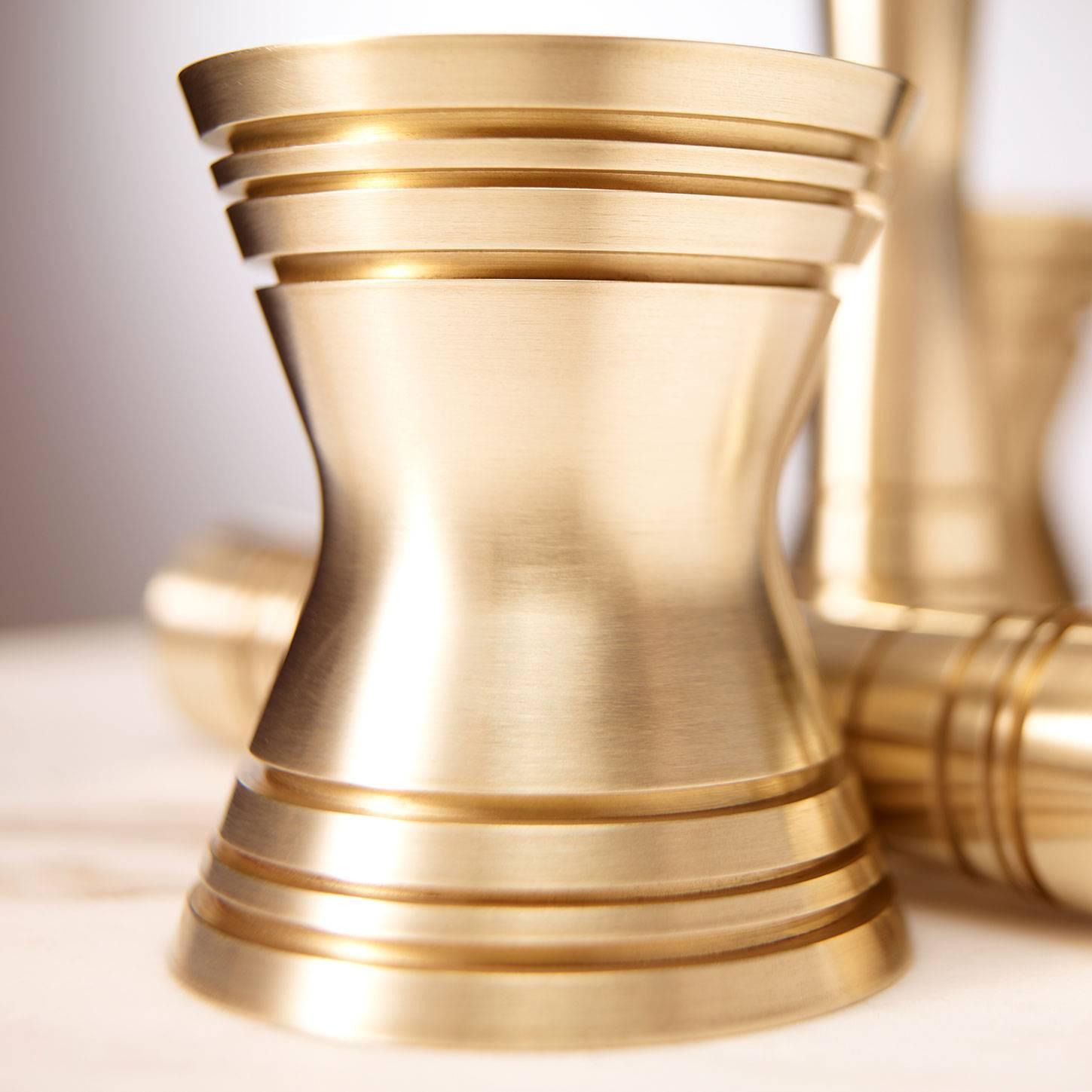 Mid-Century Modern inspired solid brass candleholders make for a substantial and elegant future heirloom. The polished brass reflects candlelight, enhancing the warmth and glow in your space, creating a soft, comforting atmosphere. 
Mix and match