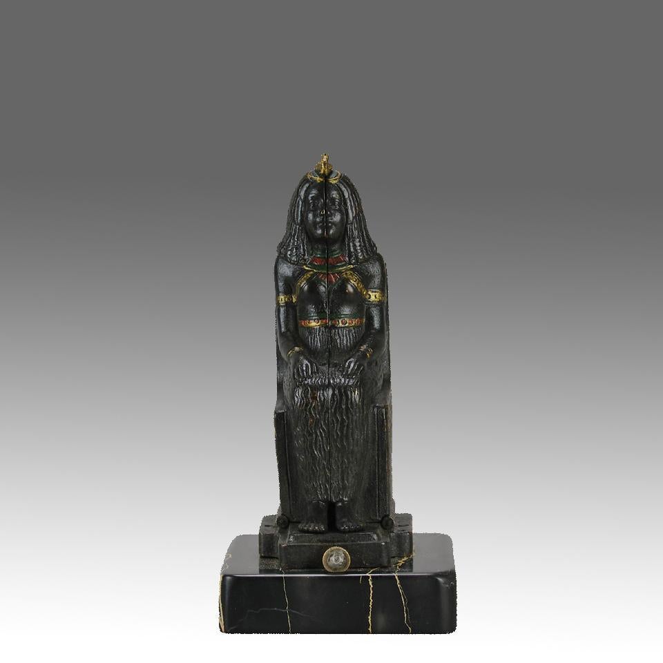 An amusing early 20th Century cold painted Austrian bronze figure modelled as a seated ancient Egyptian deity hinged to reveal a seated beauty with fine golden colour, stamped with Bergman 'B' in an amphora vase.

ADDITIONAL INFORMATION
Height:     