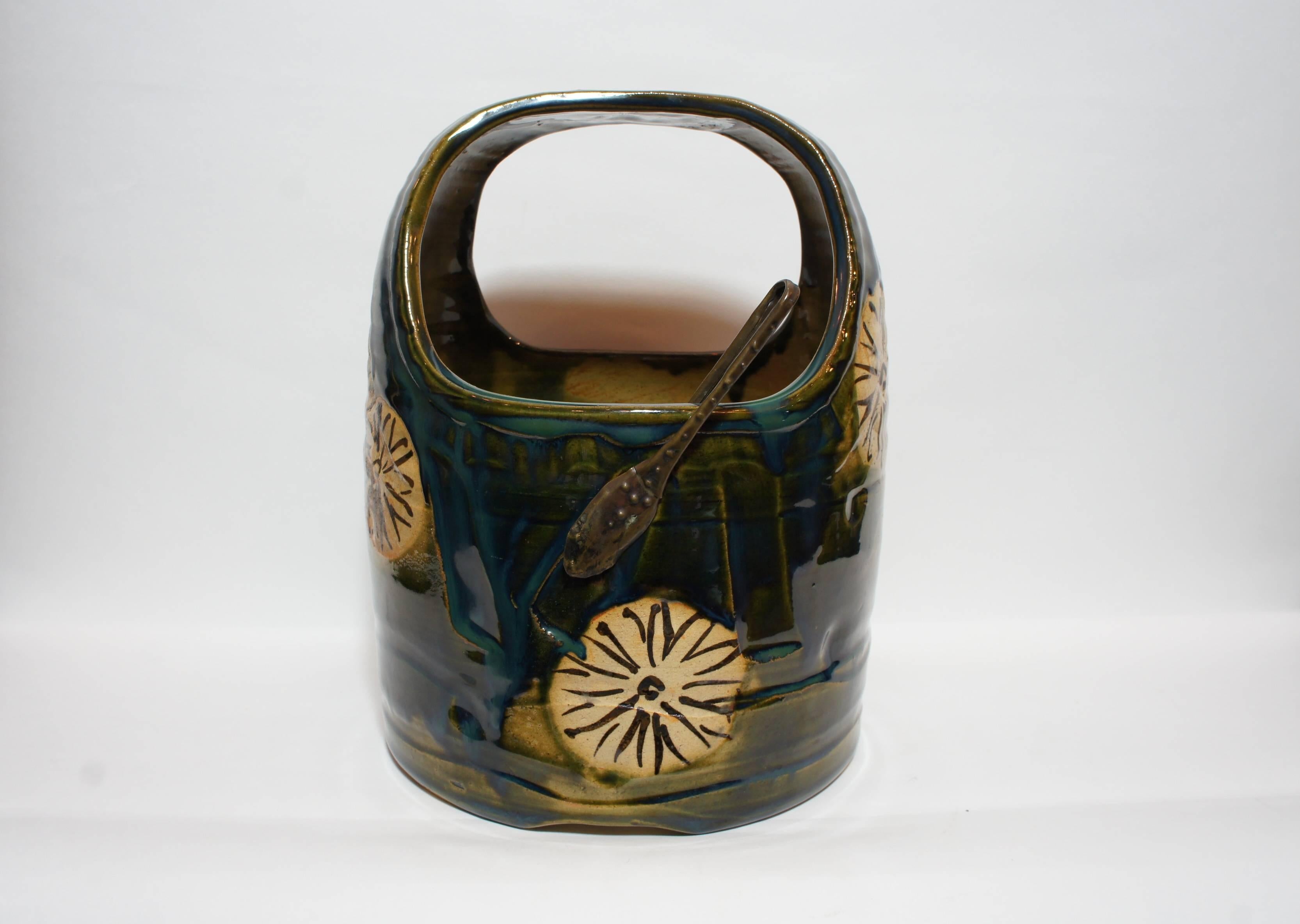 This beautiful green Oribe Hibachi (Japanese traditional heating device) belonged to an antique collector in Owari, Japan (1904-1982). The antiques dealer had purchased it from the estate of the owner of a weaving factory who lived in Owari,