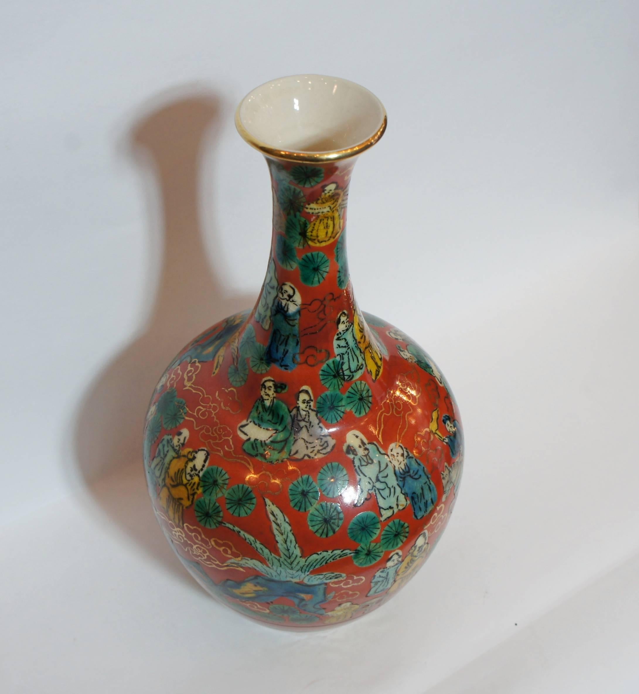 Kutani Aoki Mokubei Ware vase, Japan. The characteristic deep and bright colors and patterns of Kutani Ware are highlighted on this delicate period vase.
 
Kutani ware is a style of Japanese porcelain traditionally from Kutani, now a part of Kaga,