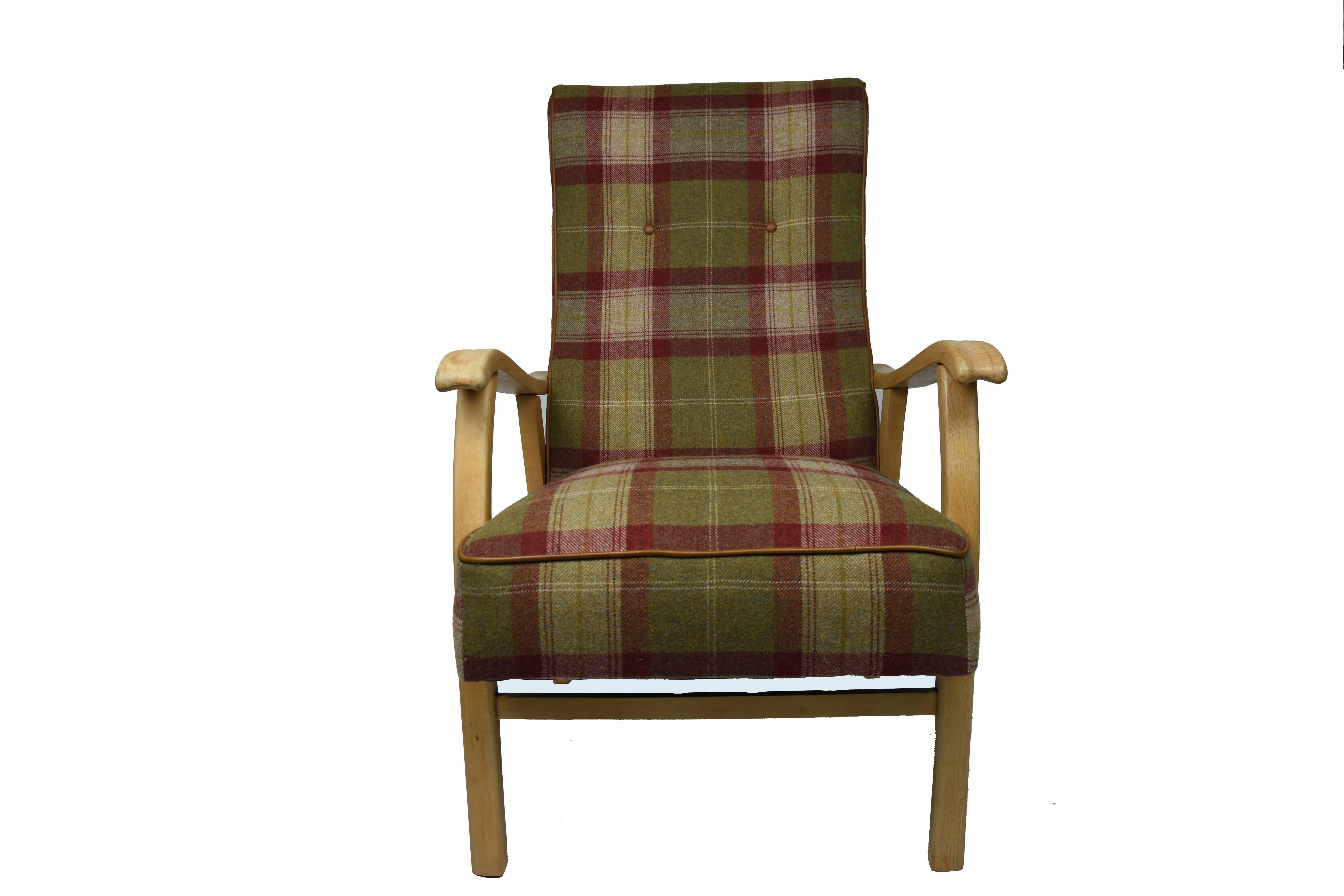 Redesigned and cared to have a unique look, this shabby chic armchair has an immaculate finish. Featuring a beautiful wool check fabric, this elegant piece can transform your home in a lovely place. Fully upholstered using leather piping, its