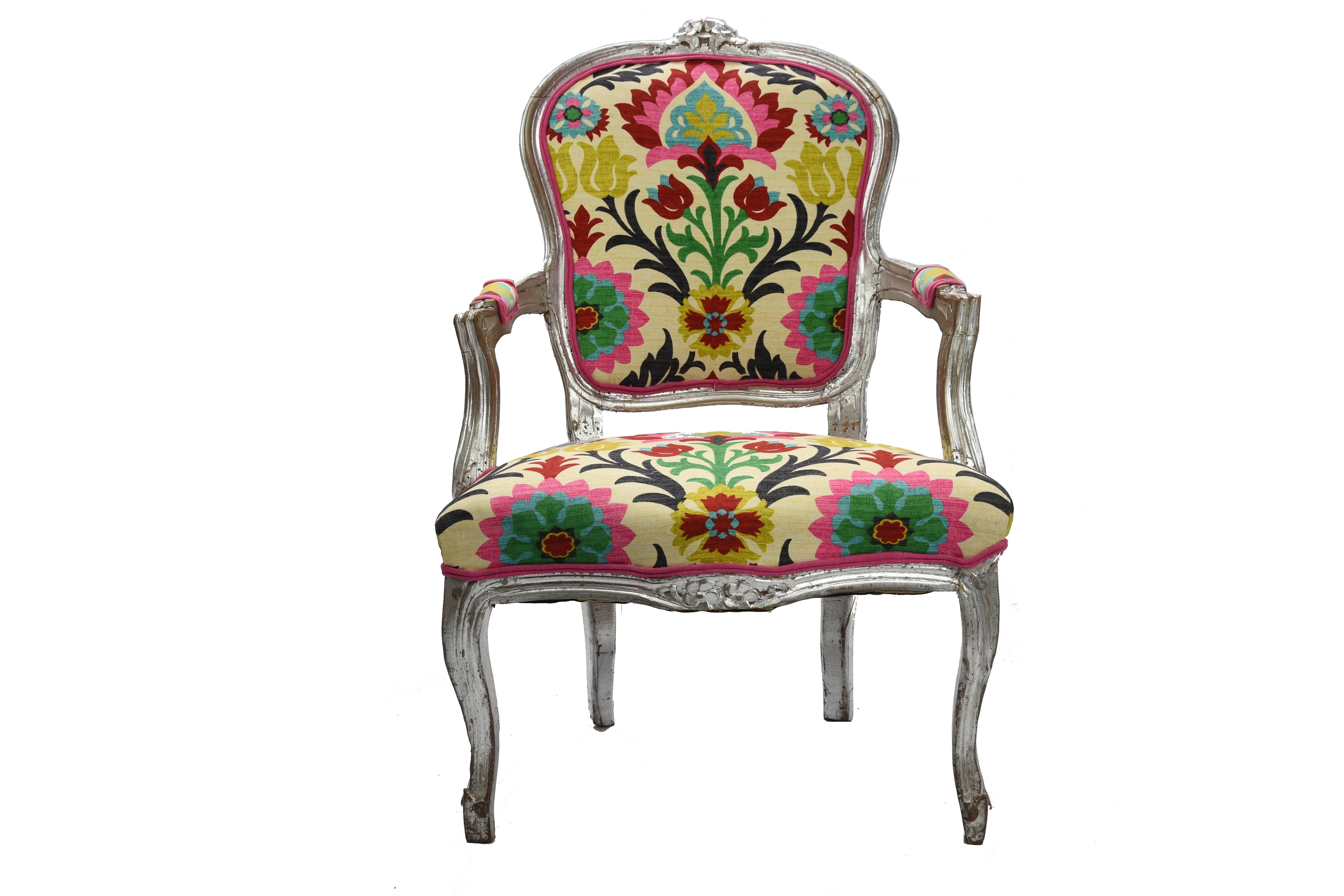 Reupholstered and cared to have a unique look, this Louis XVI style armchair has a vintage finish. Featuring a beautiful Waverly Santa Maria Desert Flower, this elegant piece can transform your home in a lovely place. Fully upholstered using pink