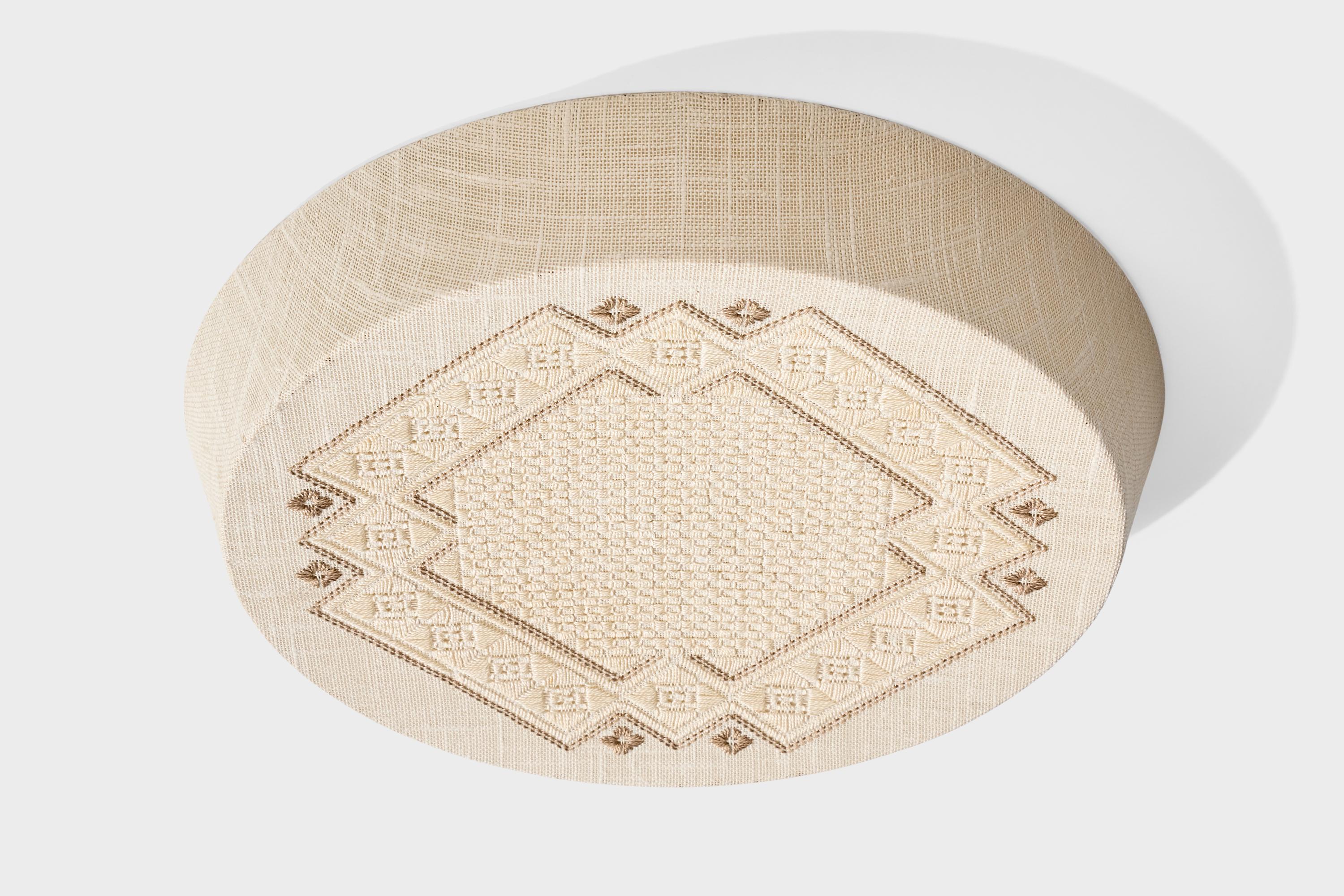 A cream-white embroidery fabric flush mount designed and produced in Sweden, c. 1970s.

Wear consistent with age and use

Overall Dimensions (inches): 3.75