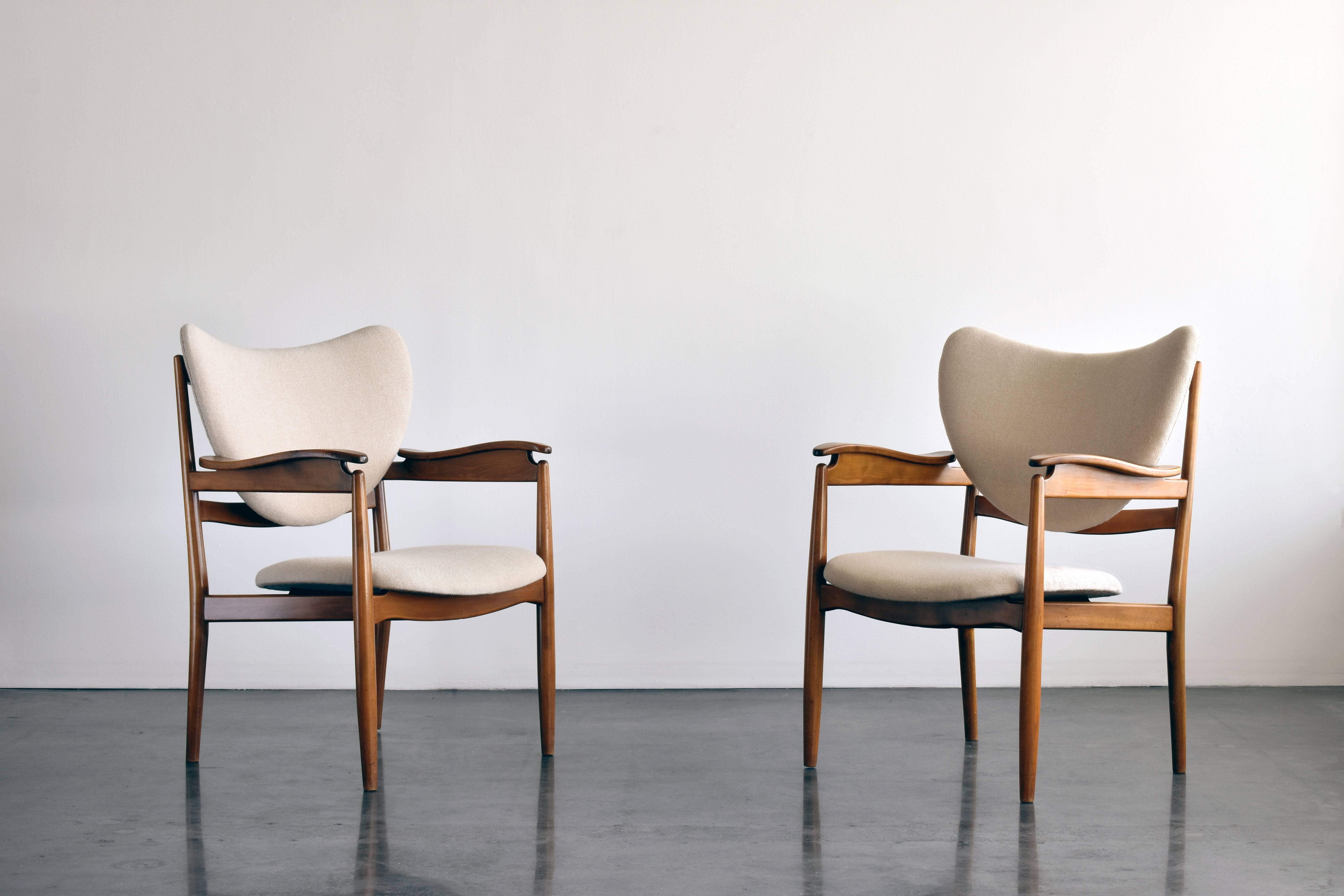 A pair of organic armchairs. Brand new fabric sourced and upholstered in Scandinavia beech frames.

In 1949, the year Finn Juhl designed the seminal chieftain chair, he also designed this less known chair for manufacturer Søren Willadsen.