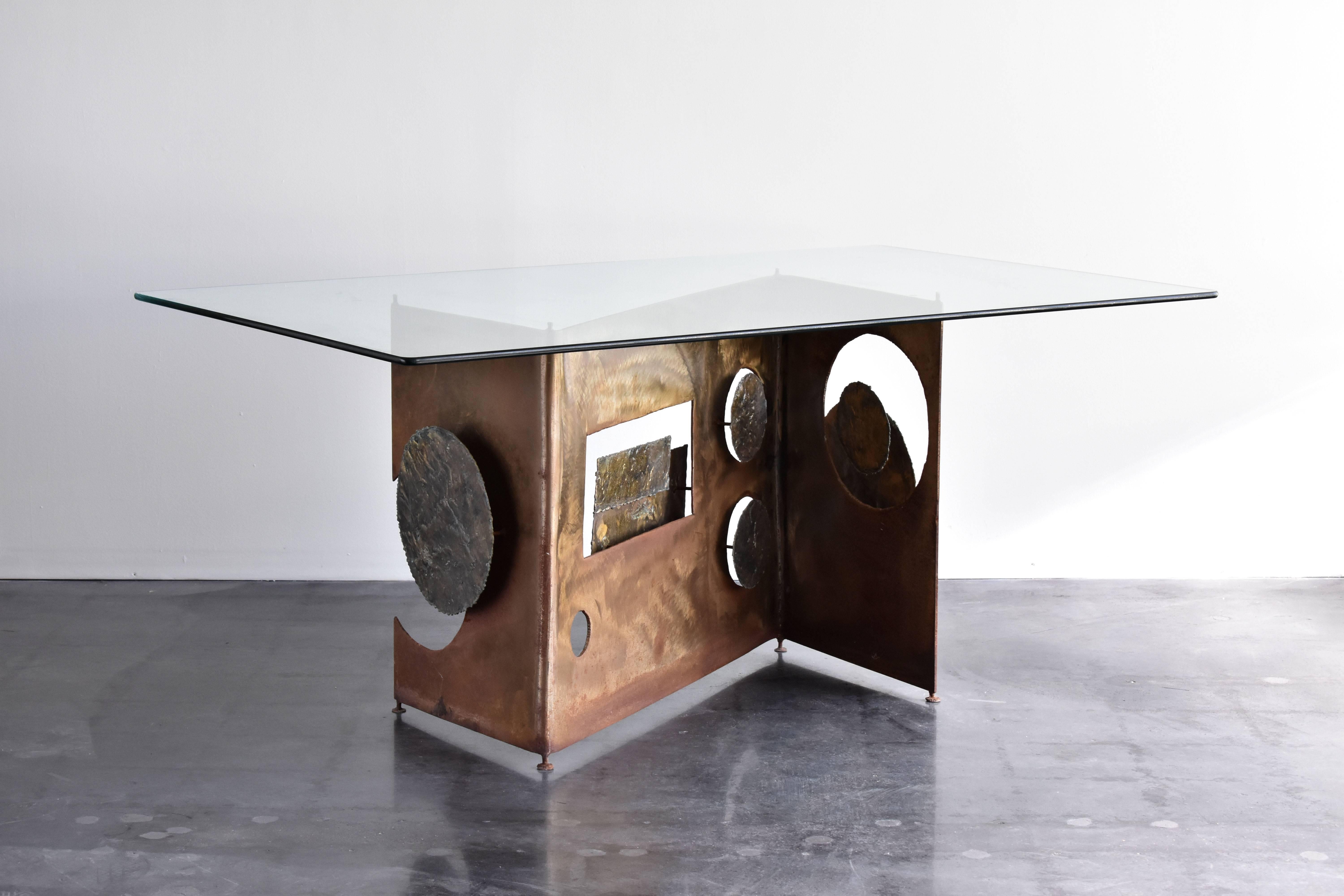 A sculptural steel and bronze base that can function as a console, center table or dining table. Handcrafted in the studio of Silas Seandel in Chelsea, Manhattan. In the work of Seandel, there are no enamels, no veneers, or unnatural materials, and