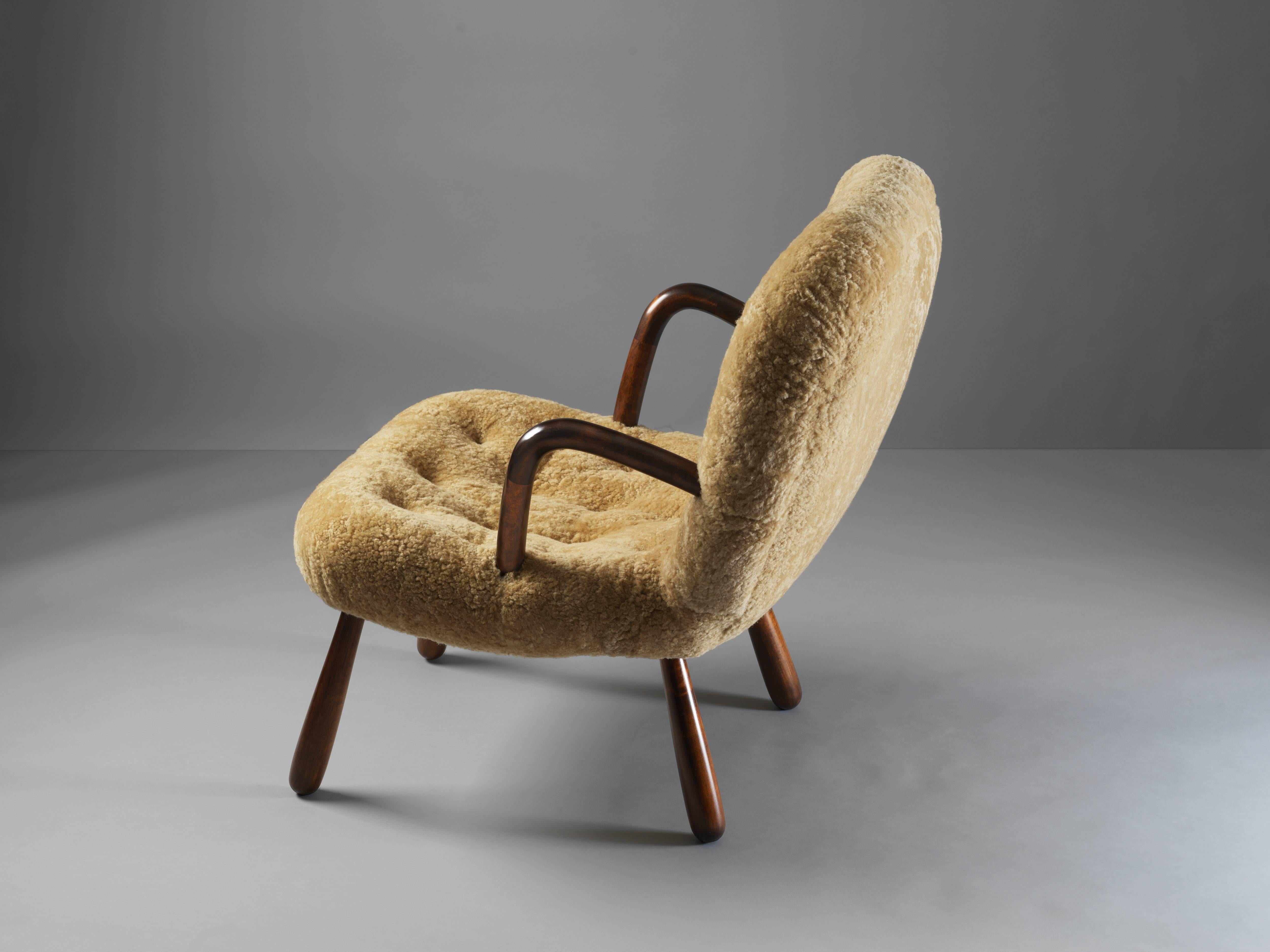 Scandinavian Modern Philip Arctander ( attributed) Clam Armchair Lambskin and Stained Wood, 1940s