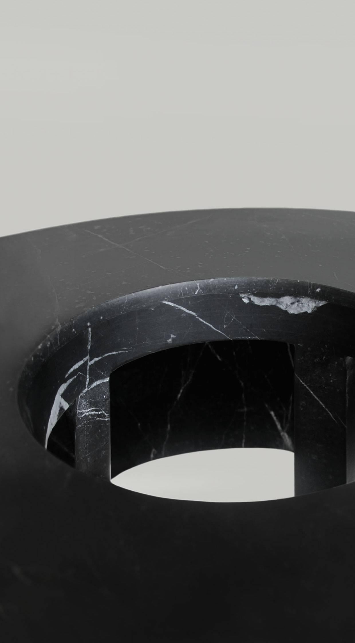 Marble table lamp by Gilles Caffier.

Black marble.