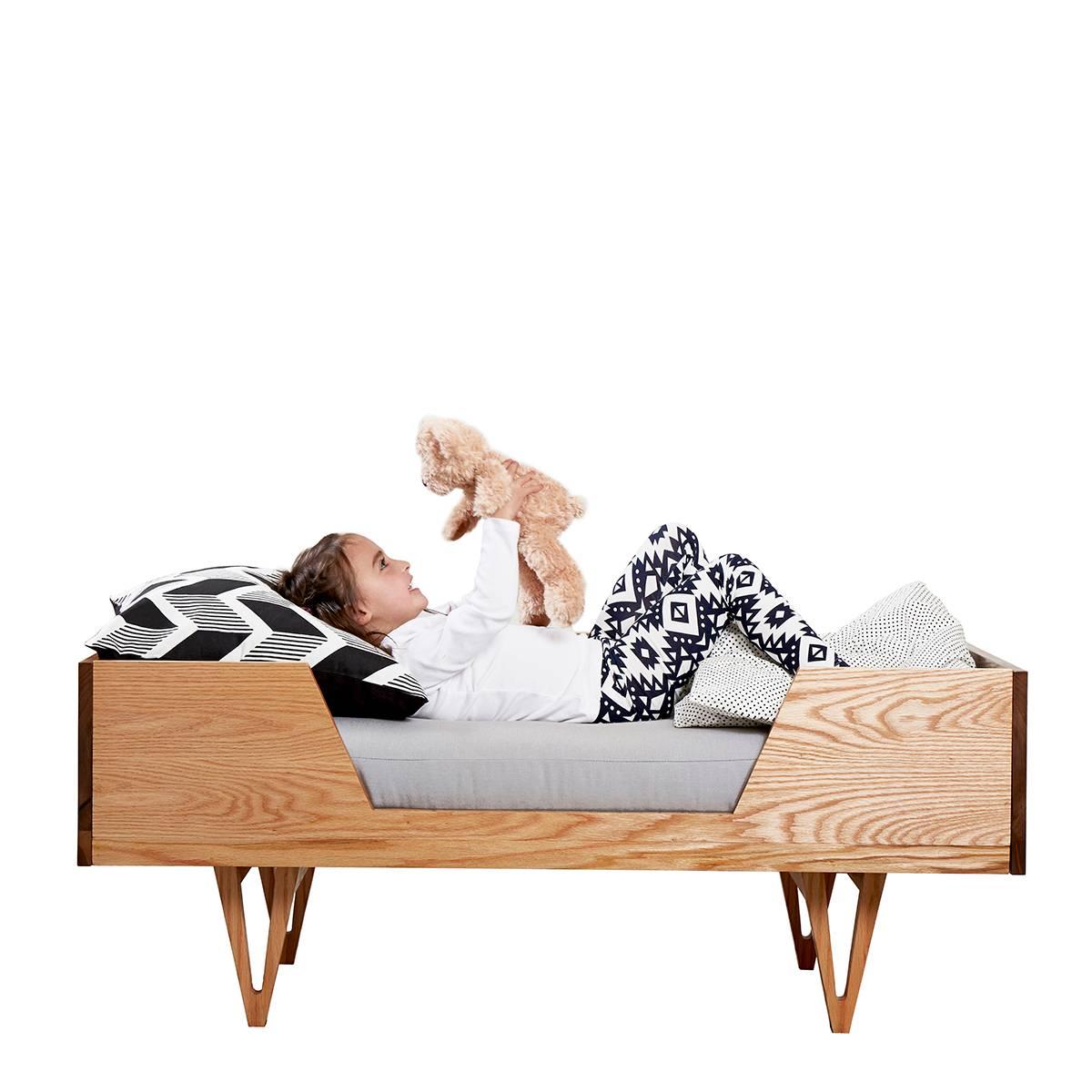 Harrison is a piece of furniture for life inspired by Mid-Century Modern design.  The Harrison  toddler bed is a transitional bed and can be used up until roughly 5-6 years old. Thereafter it can be converted into a daybed with the addition of the