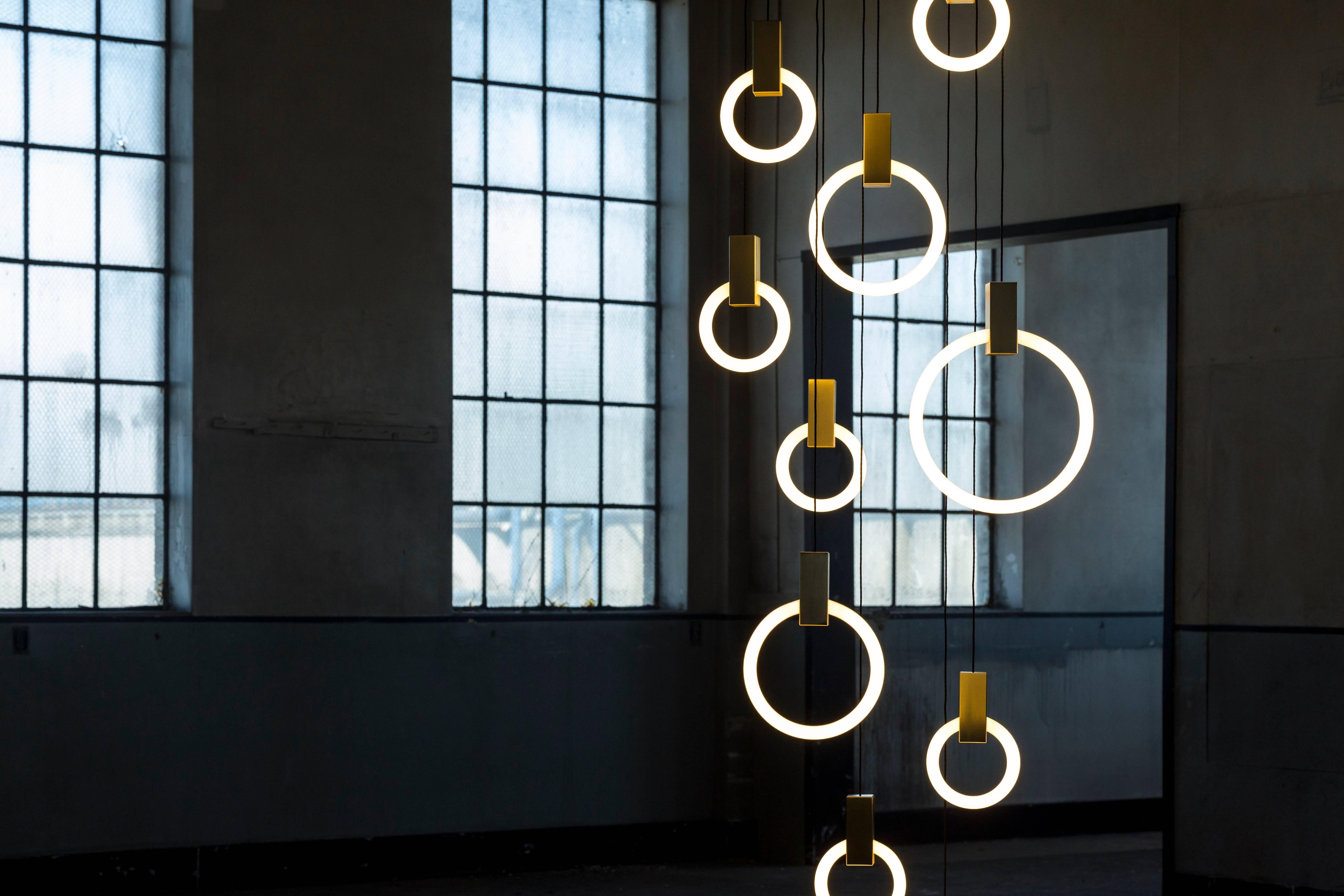 Originally conceived as a graphical interpretation of effervescence, Halo is a series of bold lamps inspired by the warm glow of their illuminaire. The modularity of the Halo system allows the pendants to be suspended in a multitude of compositions,