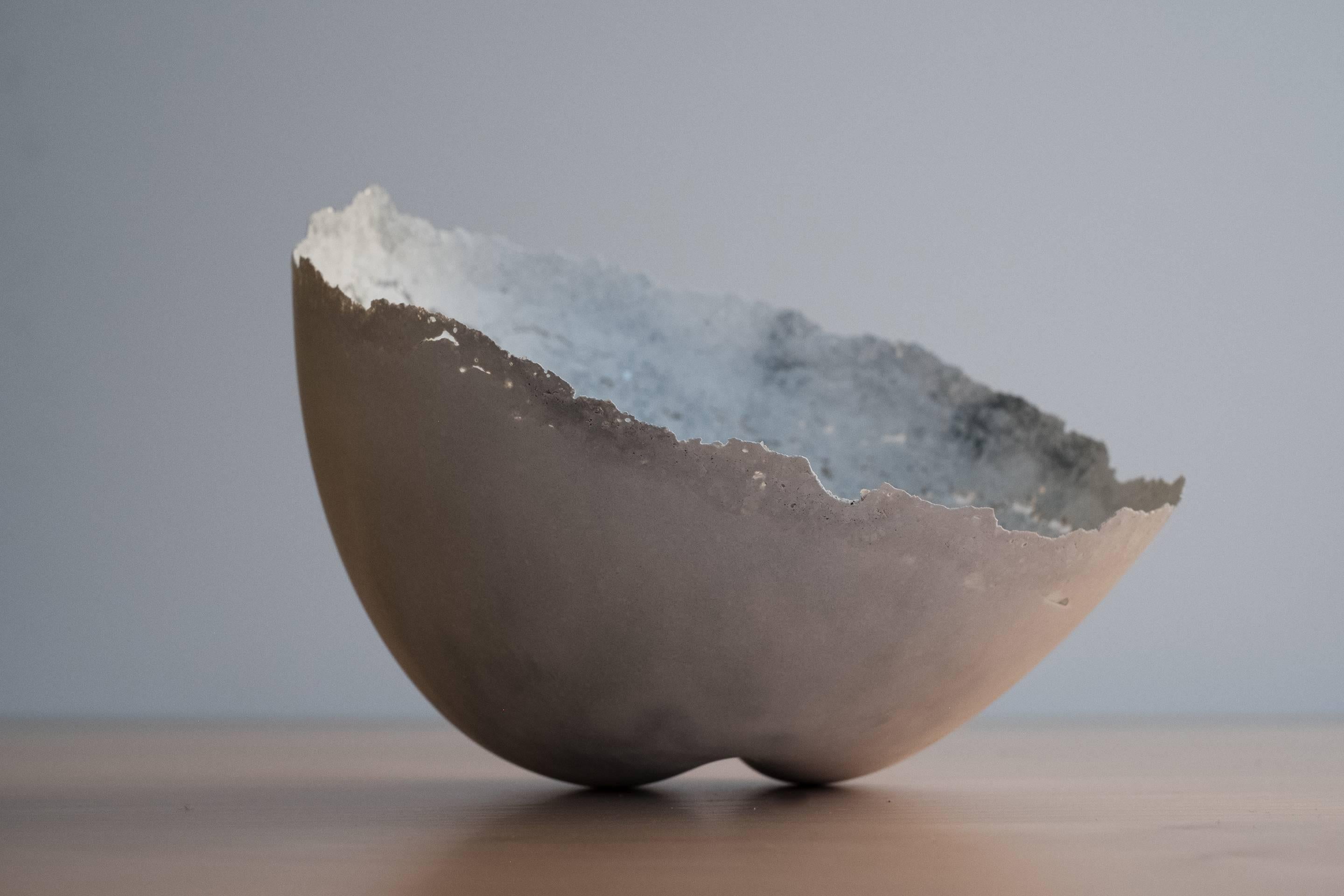 A collection of 104 unique bowls, the Concrete Series by UMÉ Studio expresses the tension between heavy concrete and its delicate edge generated by hand pouring. While one assumes concrete should be strong and durable, it is, at its core, fragile.