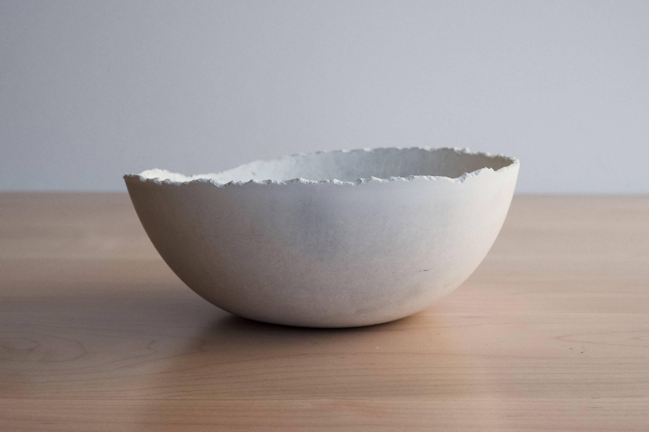 A collection of 200 unique bowls, the Concrete series by UMÉ Studio expresses the tension between heavy concrete and its delicate edge generated by hand pouring. While one assumes concrete should be strong and durable, it is, at its core, fragile.