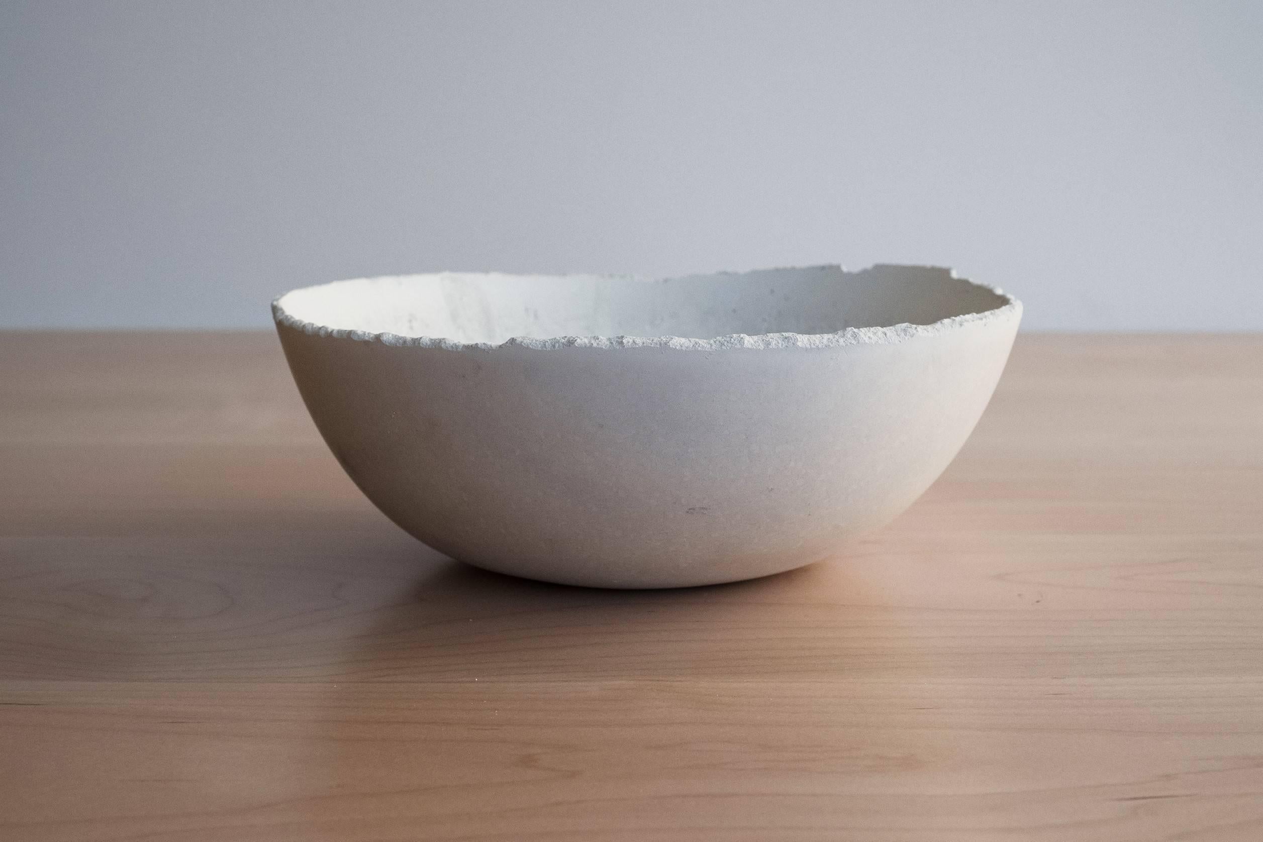 A collection of 200 unique bowls, the Concrete Series by UMÉ Studio expresses the tension between heavy concrete and its delicate edge generated by hand pouring. While one assumes concrete should be strong and durable, it is, at its core, fragile.