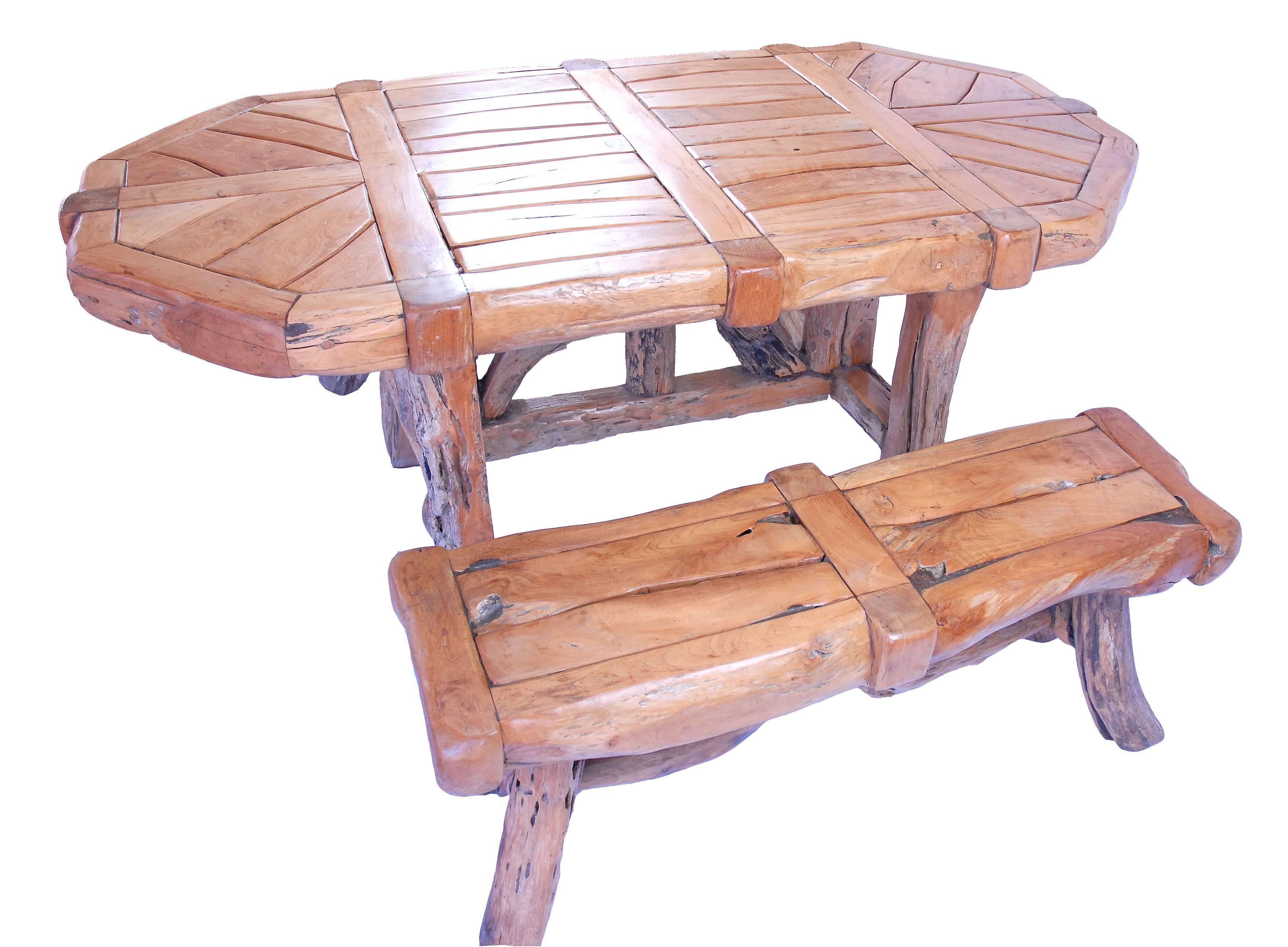 Sustainably harvested teak dining table set with benches.