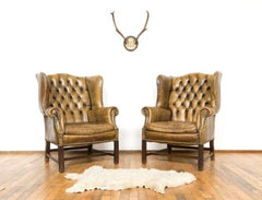 Pair of Two Cognac Leather Wingback Chesterfield Club Chairs, circa 1950