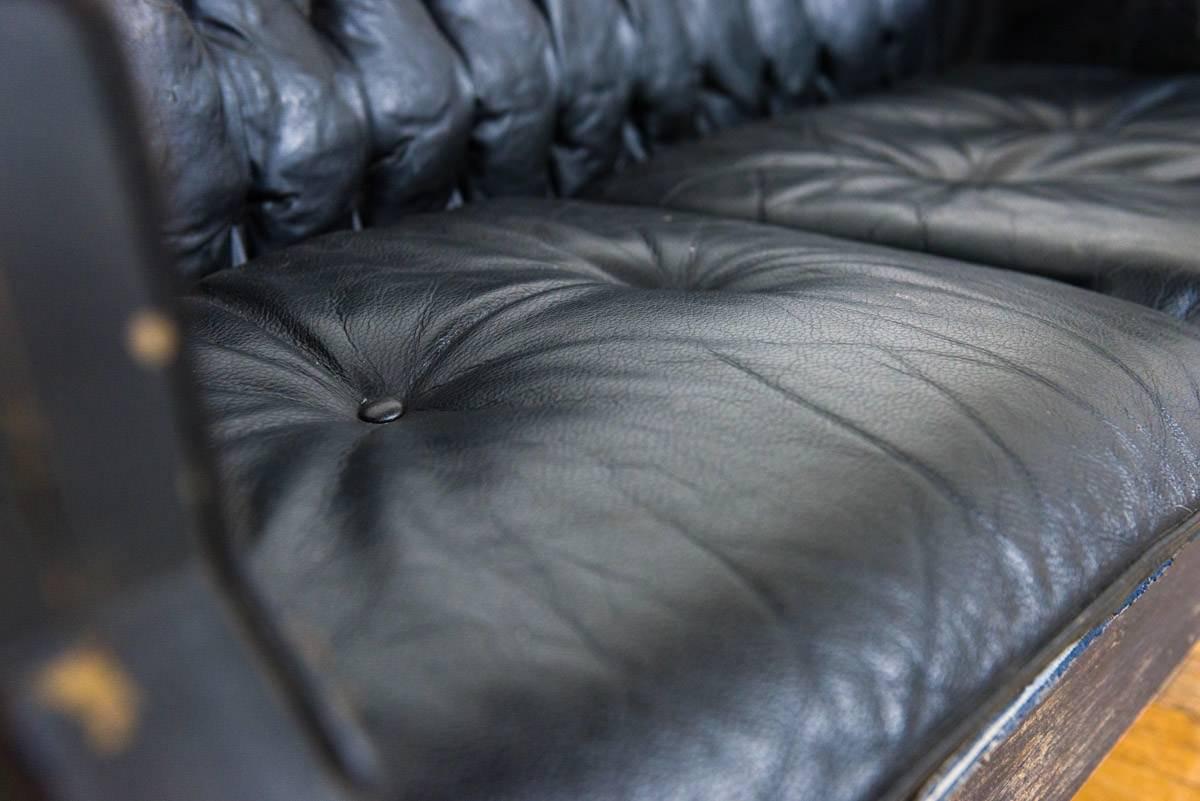 Small Buttoned Black Leather Carriage Sofa on Cast Iron Legs 1