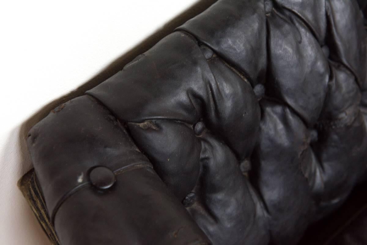 Small Buttoned Black Leather Carriage Sofa on Cast Iron Legs 4