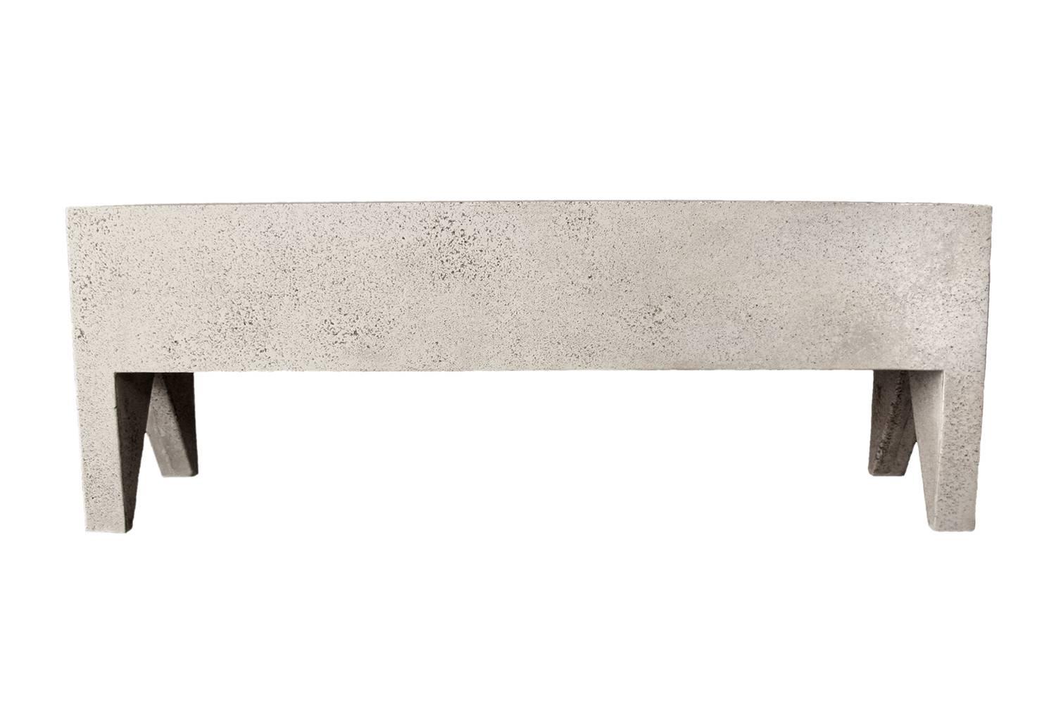 A hint of ornament. Americana at its brutalist functional extreme.

Dimensions: Width 50 in. (127 cm), depth 14 in. (35.5cm), height 18 in. (45.7 cm). Weight 45 lbs. (20.4 kg). No assembly required.

Finish Color options:
white stone
natural stone