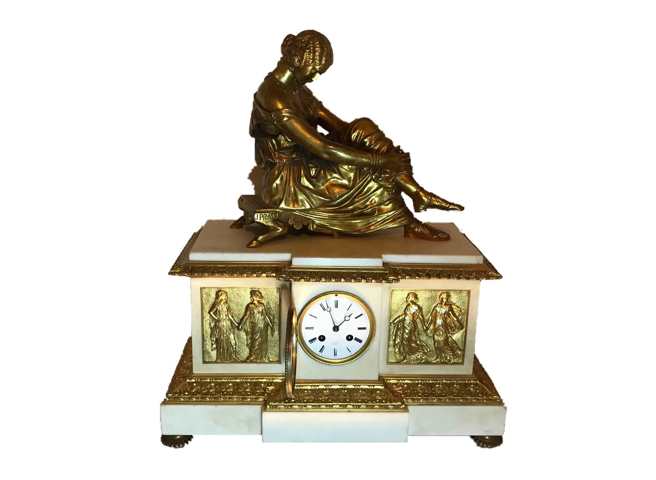 Superb signed gilt Napoleon III / Empire clock by Henri Picard, retailed by 'Mayer a Paris',
circa 1851.
The 8 day movement is stamped '1635' by Vincetti et Cie and shows the first Medaille D'argent stamp awarded to Vincetti et Cie from