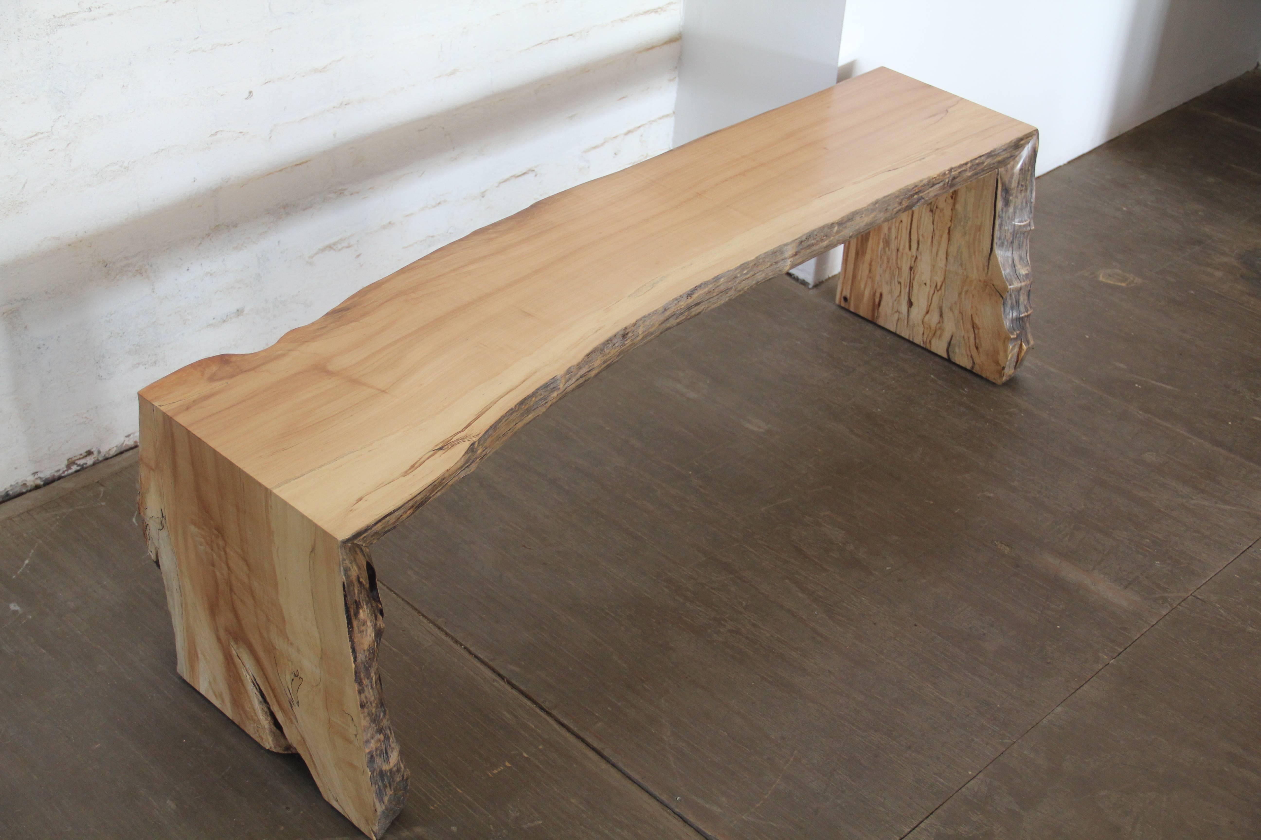 A unique board of spalted maple mitered to join the legs and seat, resulting in one entirely natural and beautiful looking bench.
    